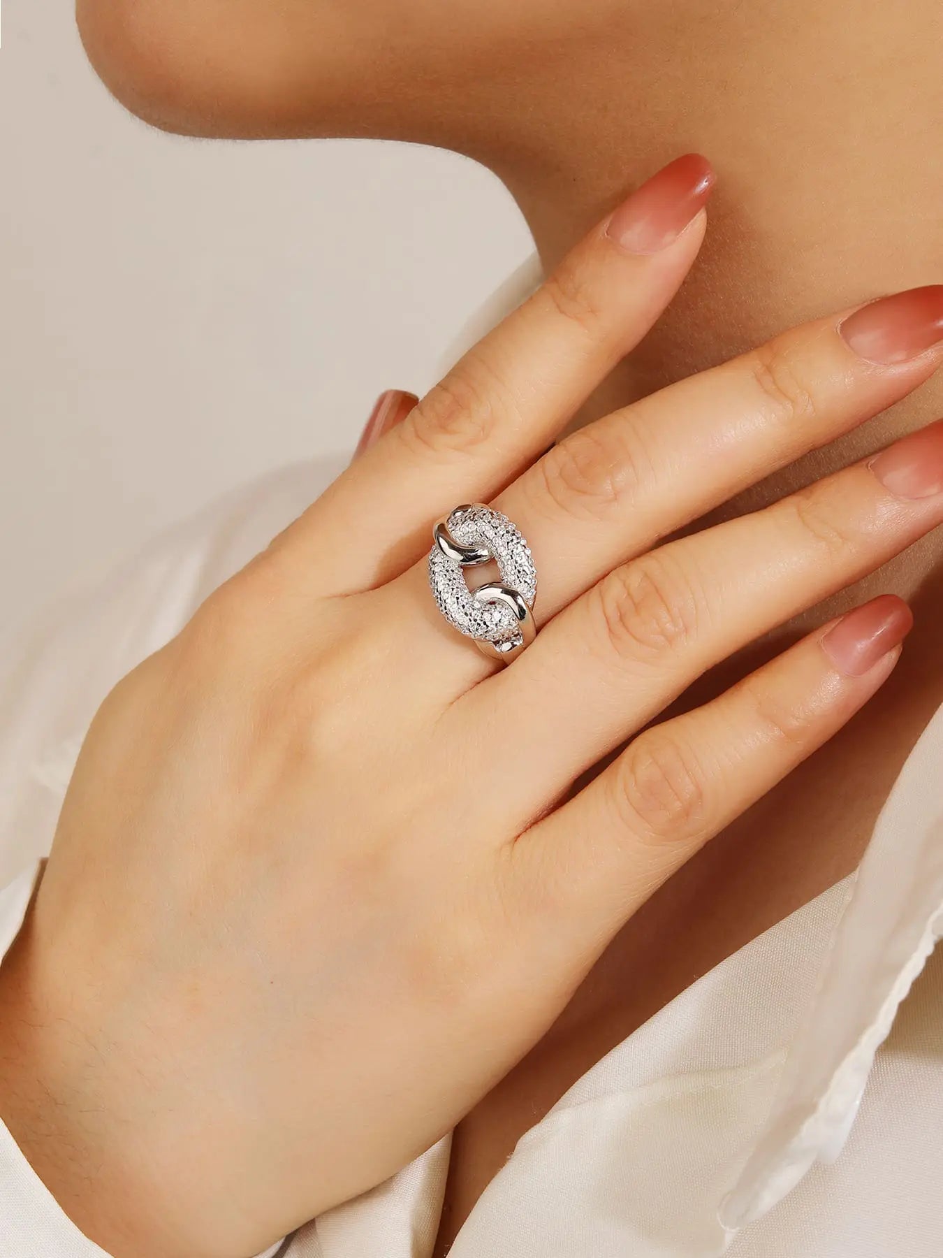 Silver link design ring with white cubic zirconia