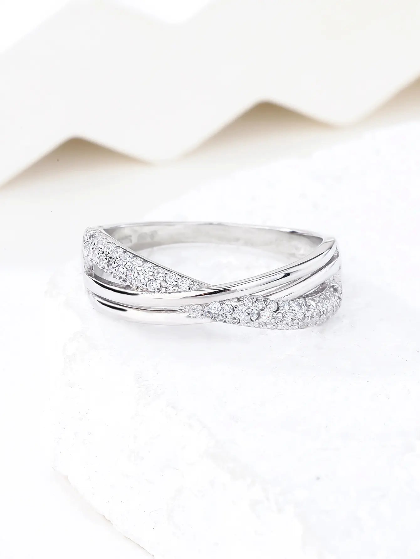 Silver micro set design ring with white cubic zirconia stones