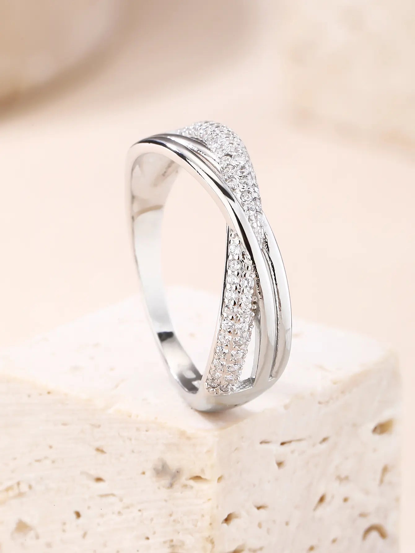 Silver micro set design ring with white cubic zirconia stones