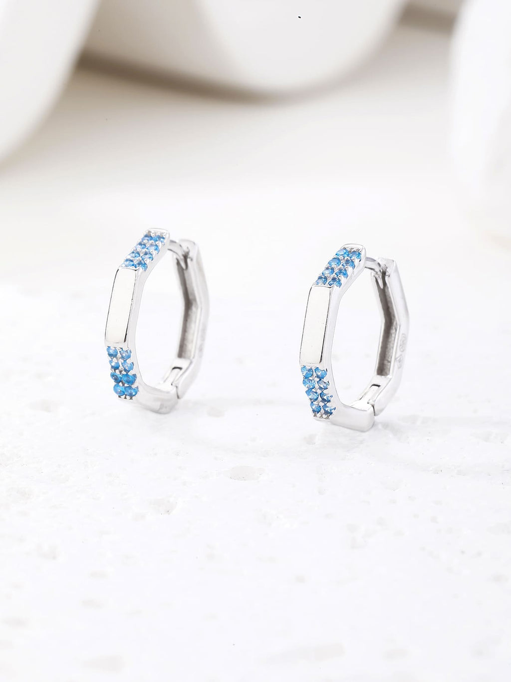 octagonal light blue stone earrings in hallmarked, rhodium-plated 925 sterling silver – lifestyle view – DRESCHER Jewellery®