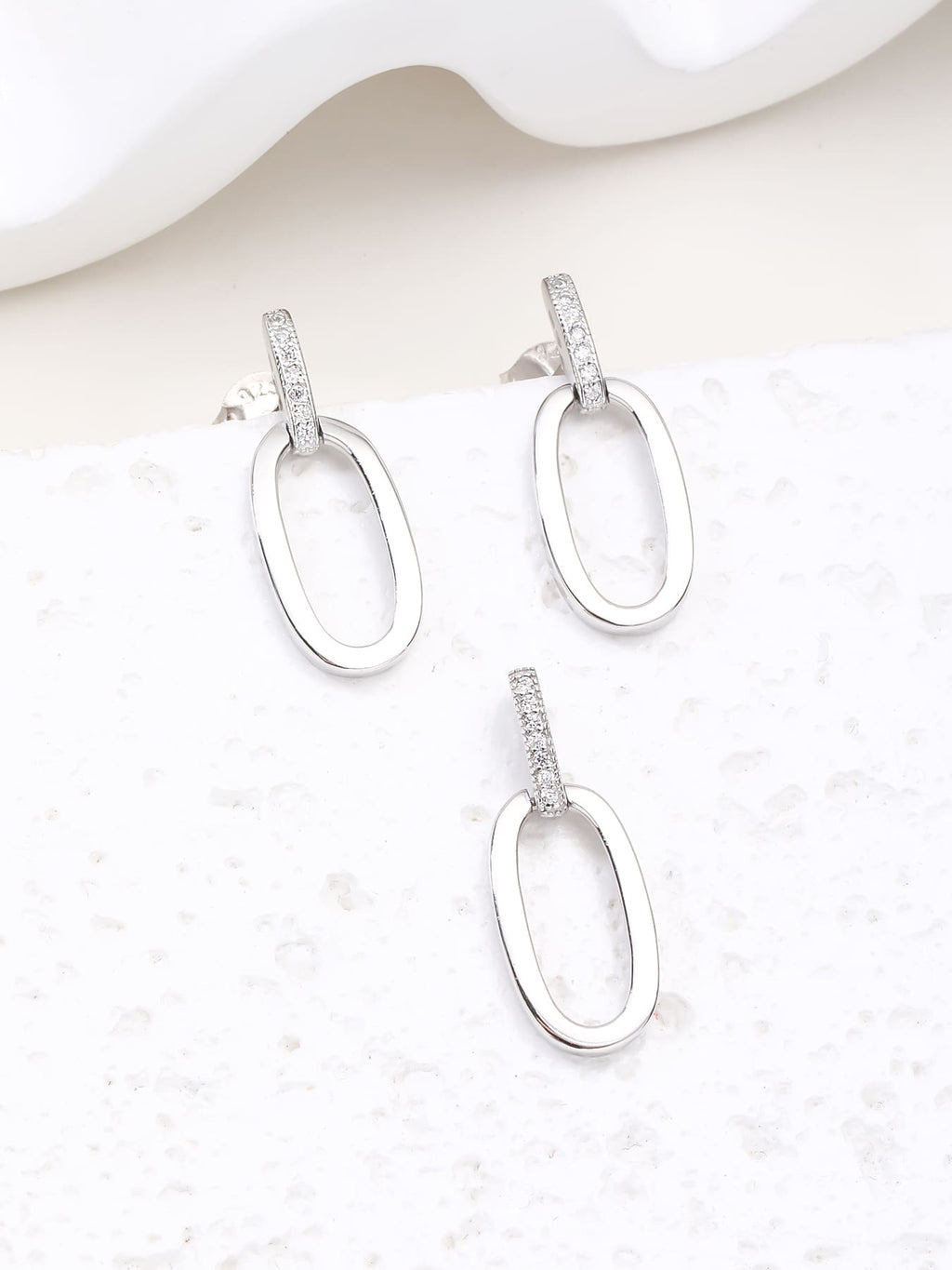 oval jeweled with white cubic zirconia stones in hallmarked, rhodium-plated 925 sterling silver – detail view – DRESCHER Jewellery®