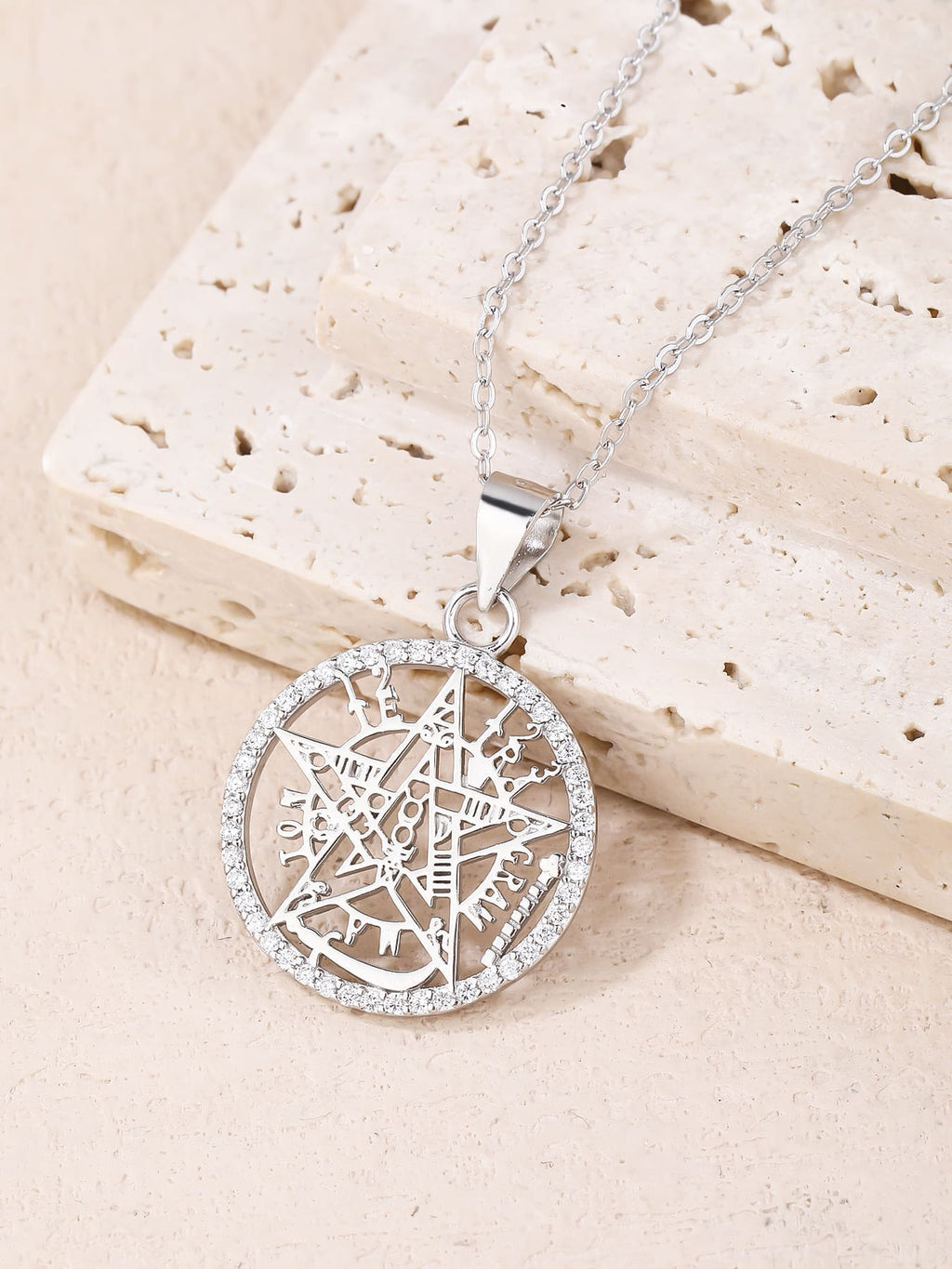 pentagram pendant with sparkling cubic zirconia in hallmarked, rhodium-plated 925 sterling silver – lifestyle view – DRESCHER Jewellery®
