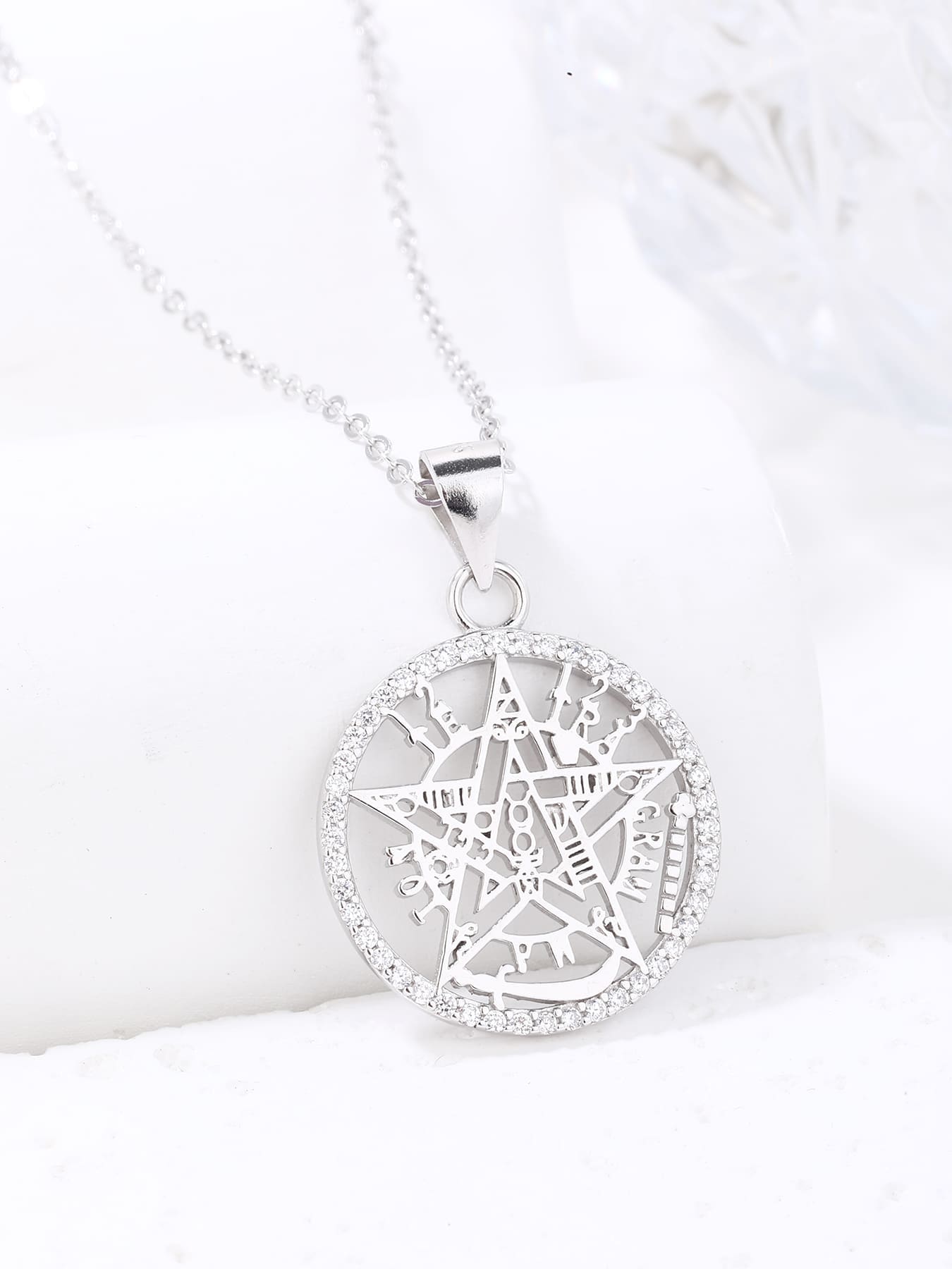pentagram pendant with sparkling cubic zirconia in hallmarked, rhodium-plated 925 sterling silver – display view – DRESCHER Jewellery®
