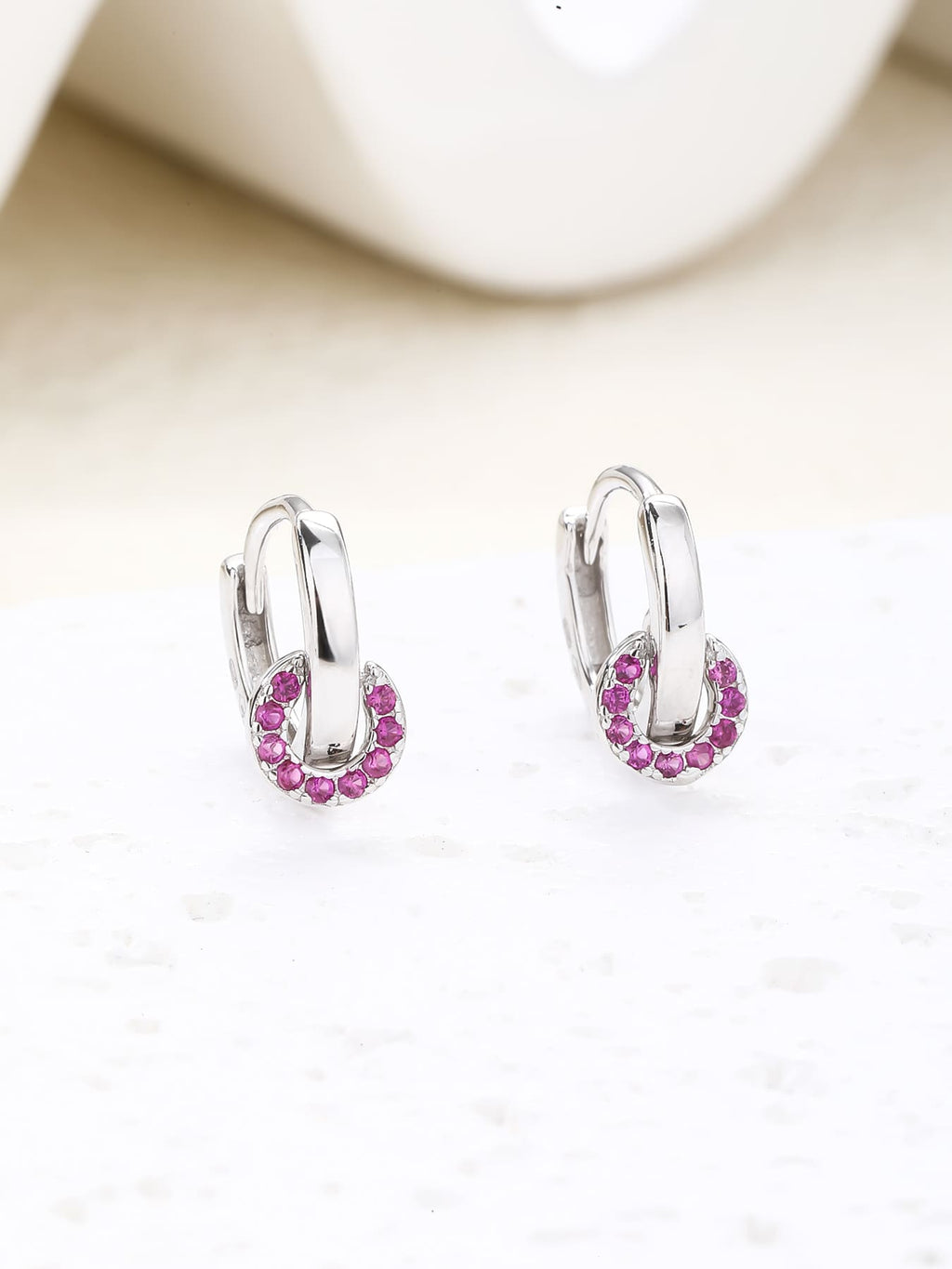 pink cubic zirconia stone hoop earrings in hallmarked, rhodium-plated 925 sterling silver – display view – DRESCHER Jewellery®