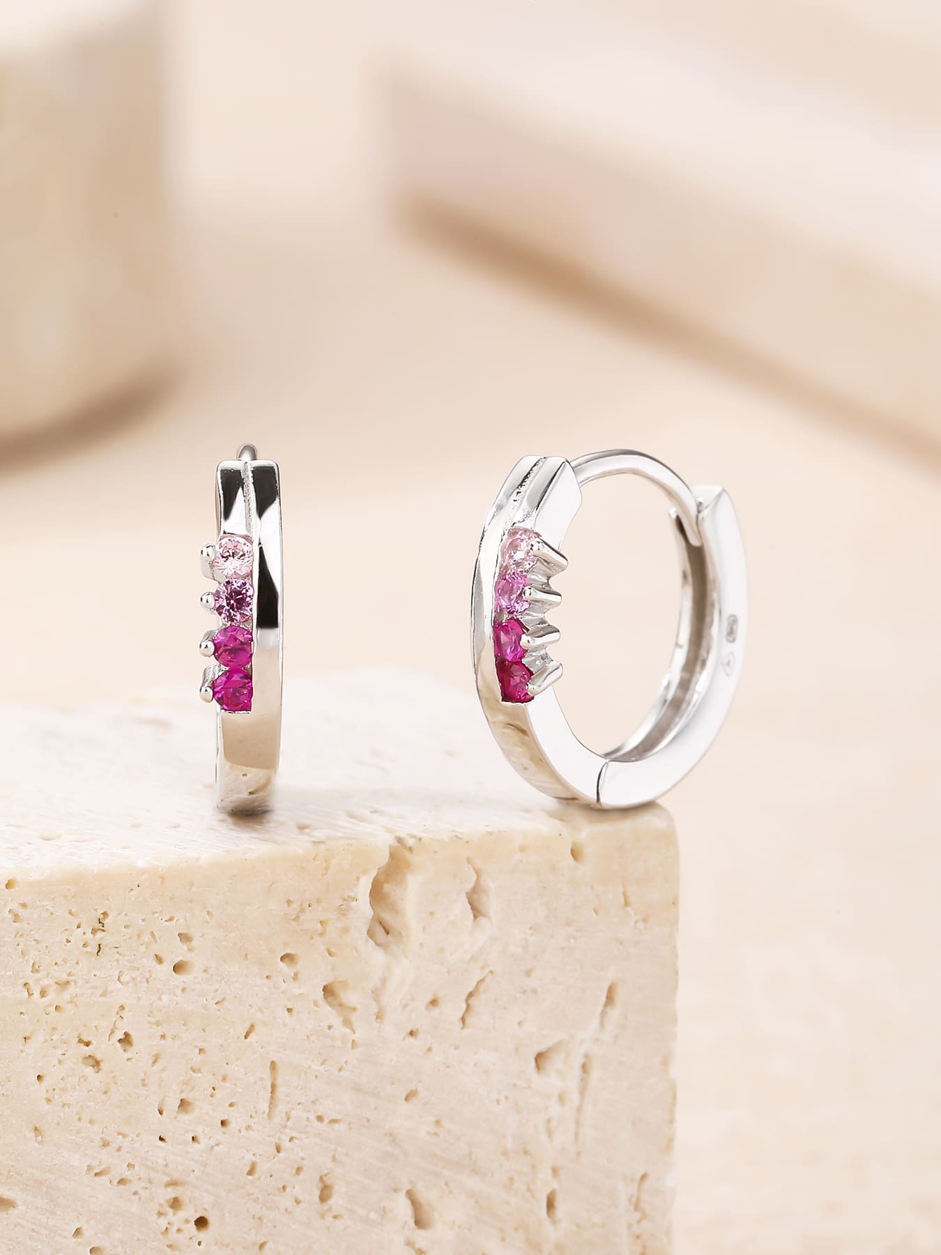 pink - red and pink cubic zirconia stone hoop earrings in hallmarked, rhodium-plated 925 sterling silver – display view – DRESCHER Jewellery®