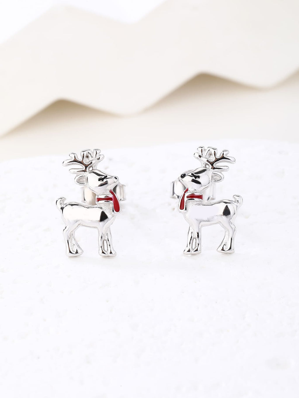 Reindeer stud earrings with red scarf in hallmarked, rhodium-plated 925 sterling silver – display view – DRESCHER Jewellery®