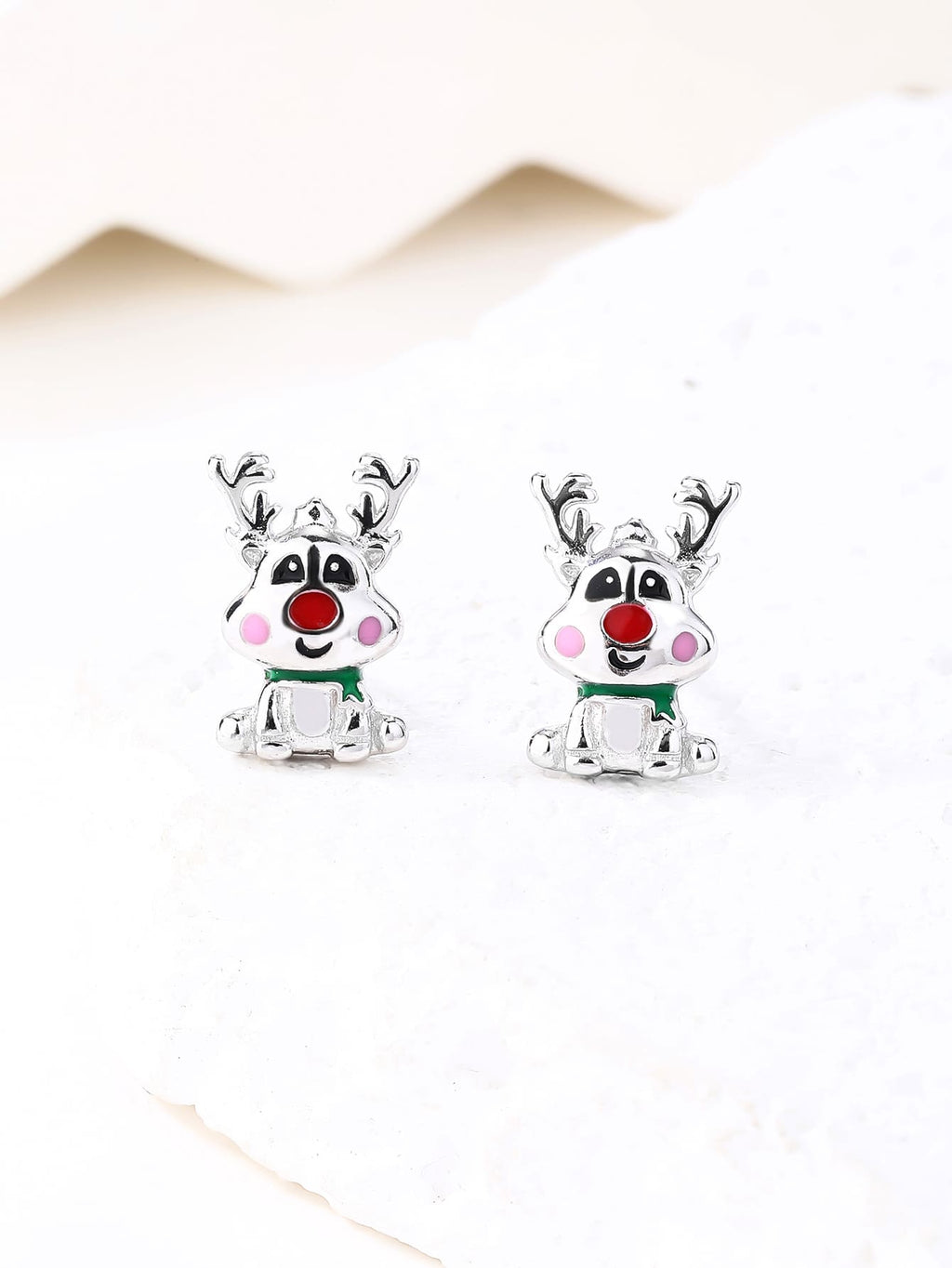 Multicoloured enamel reindeer stud earrings in hallmarked, rhodium-plated 925 sterling silver – display view – DRESCHER Jewellery®
