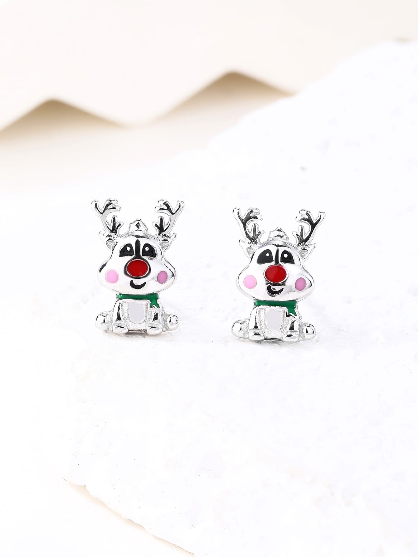 Multicoloured enamel reindeer stud earrings in hallmarked, rhodium-plated 925 sterling silver – display view – DRESCHER Jewellery®
