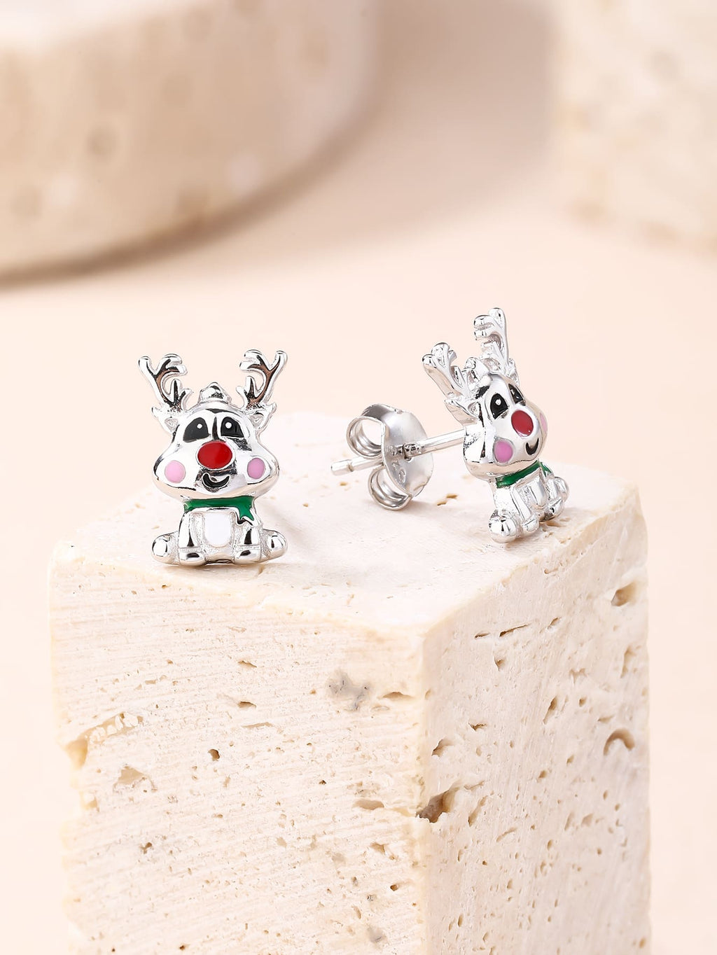 Multicoloured enamel reindeer stud earrings in hallmarked, rhodium-plated 925 sterling silver – display view – DRESCHER Jewellery®