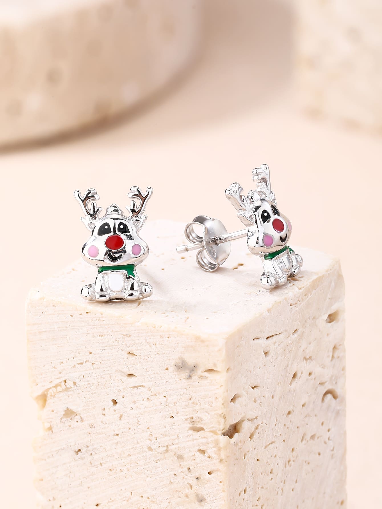 Multicoloured enamel reindeer stud earrings in hallmarked, rhodium-plated 925 sterling silver – display view – DRESCHER Jewellery®