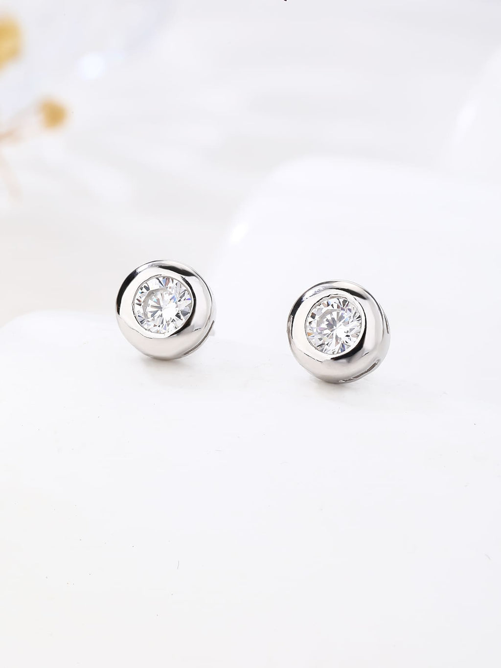 White cubic zirconia button-set stud earrings in hallmarked, rhodium-plated 925 sterling silver – display view – DRESCHER Jewellery®