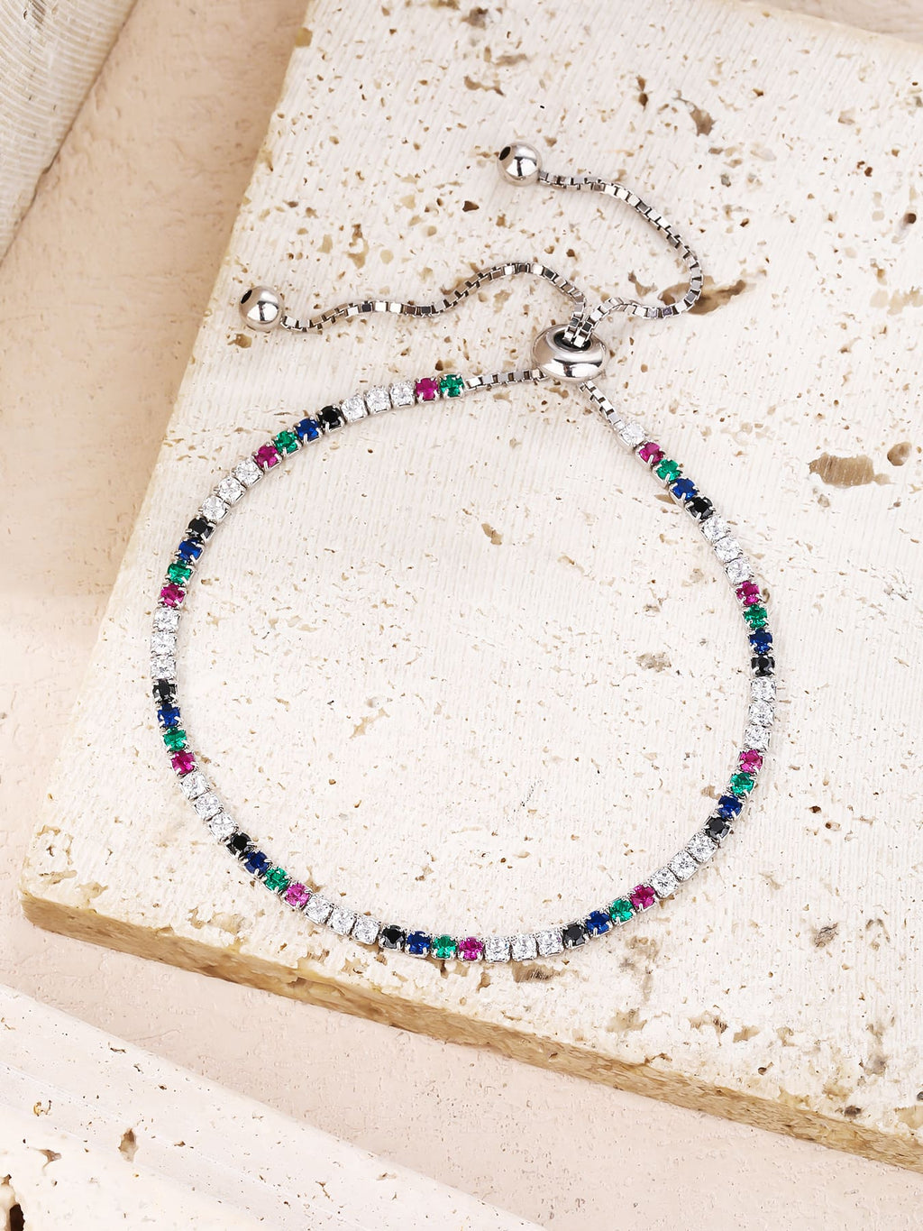 coloured zirconia bracelet with adjustable sliding clasp in hallmarked, rhodium-plated 925 sterling silver – worn view – DRESCHER Jewellery®