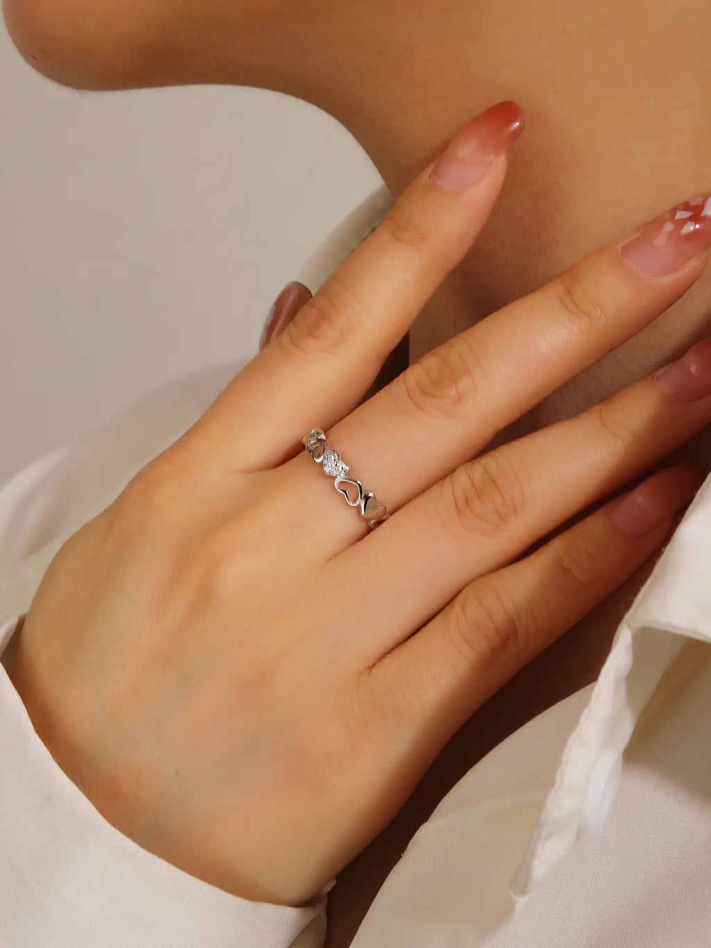 Silver heart motif ring with cubic zirconia decoration