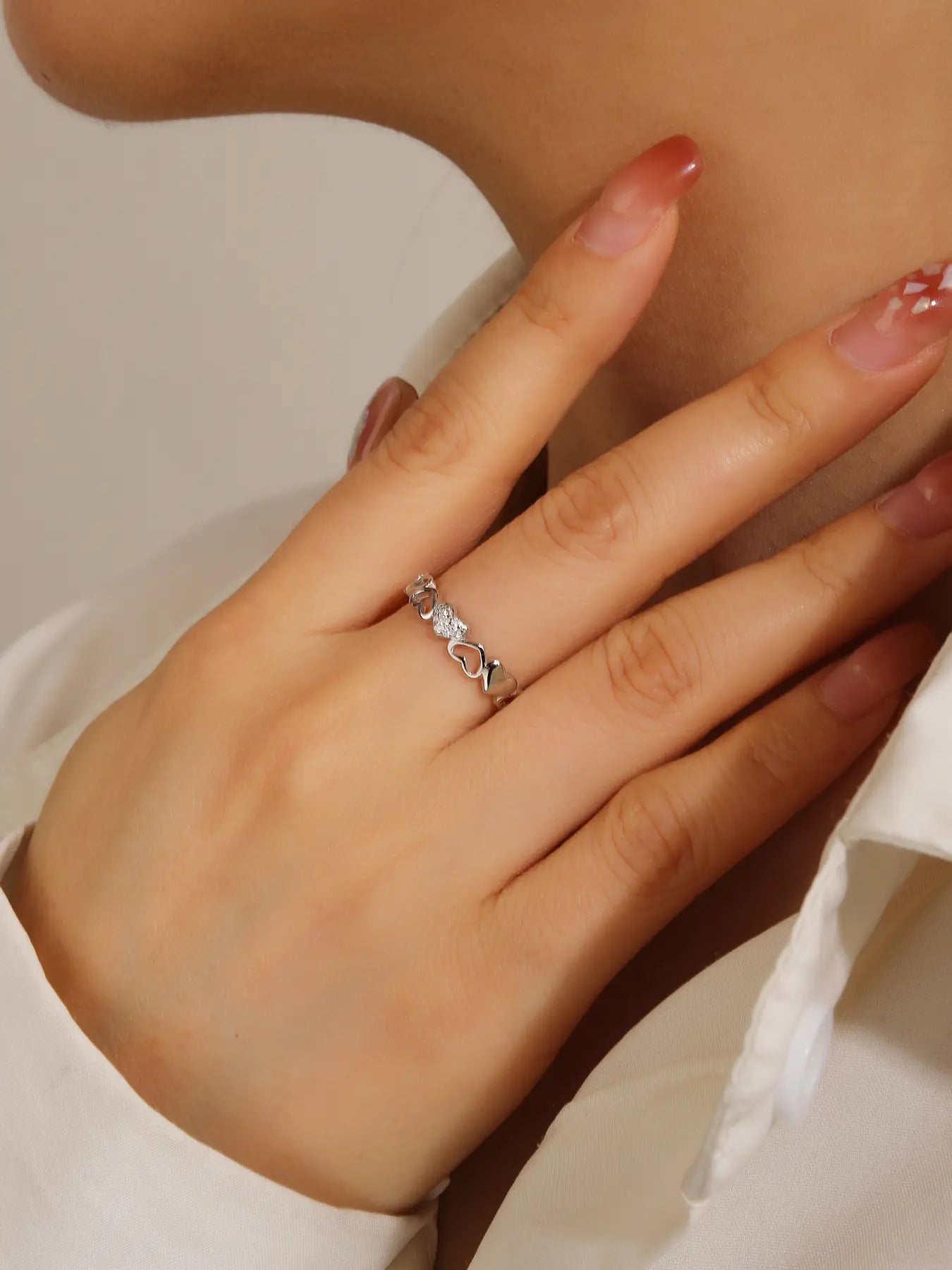 Silver heart motif ring with cubic zirconia decoration