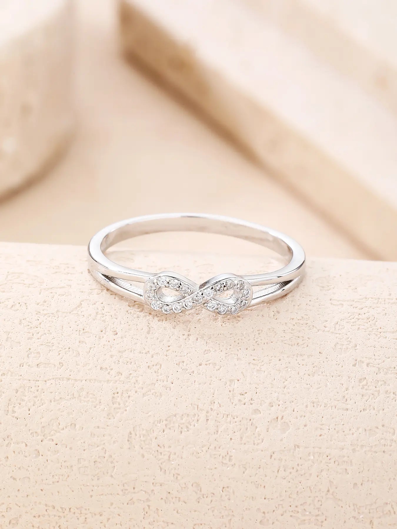 Silver infinity symbol ring with zirconia decoration