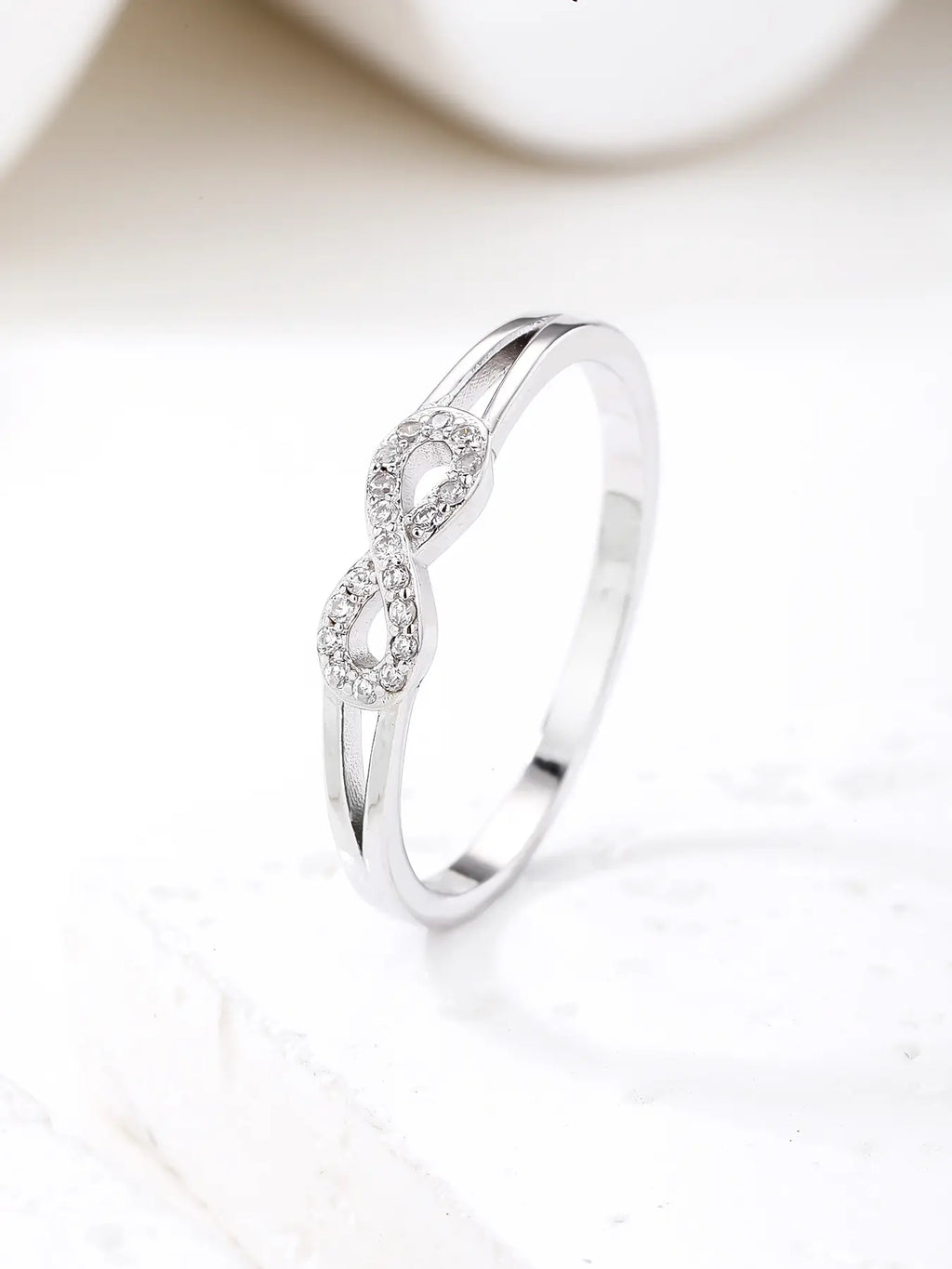 Silver infinity symbol ring with zirconia decoration