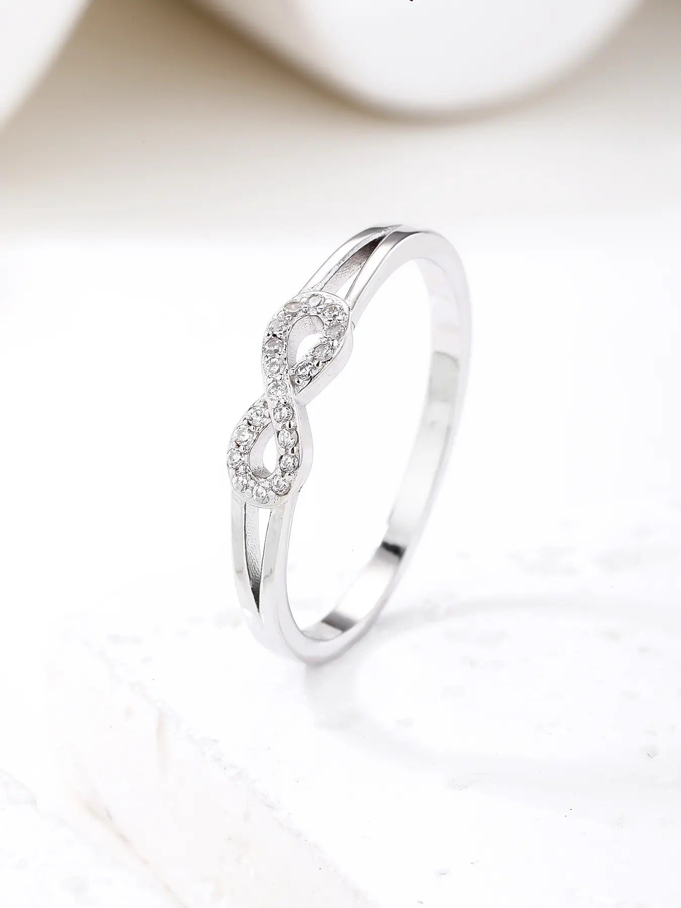Silver infinity symbol ring with zirconia decoration