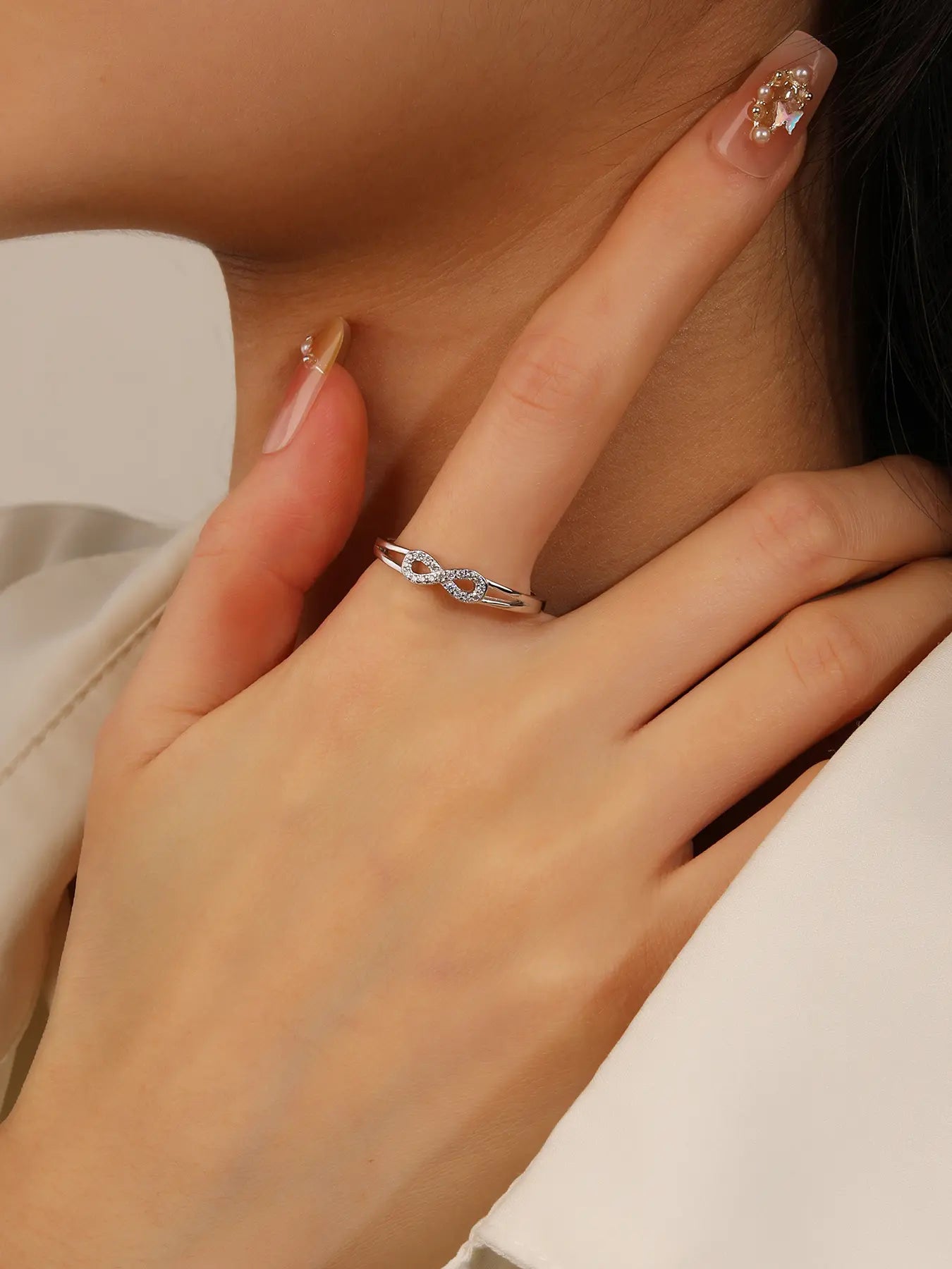 Silver infinity symbol ring with zirconia decoration