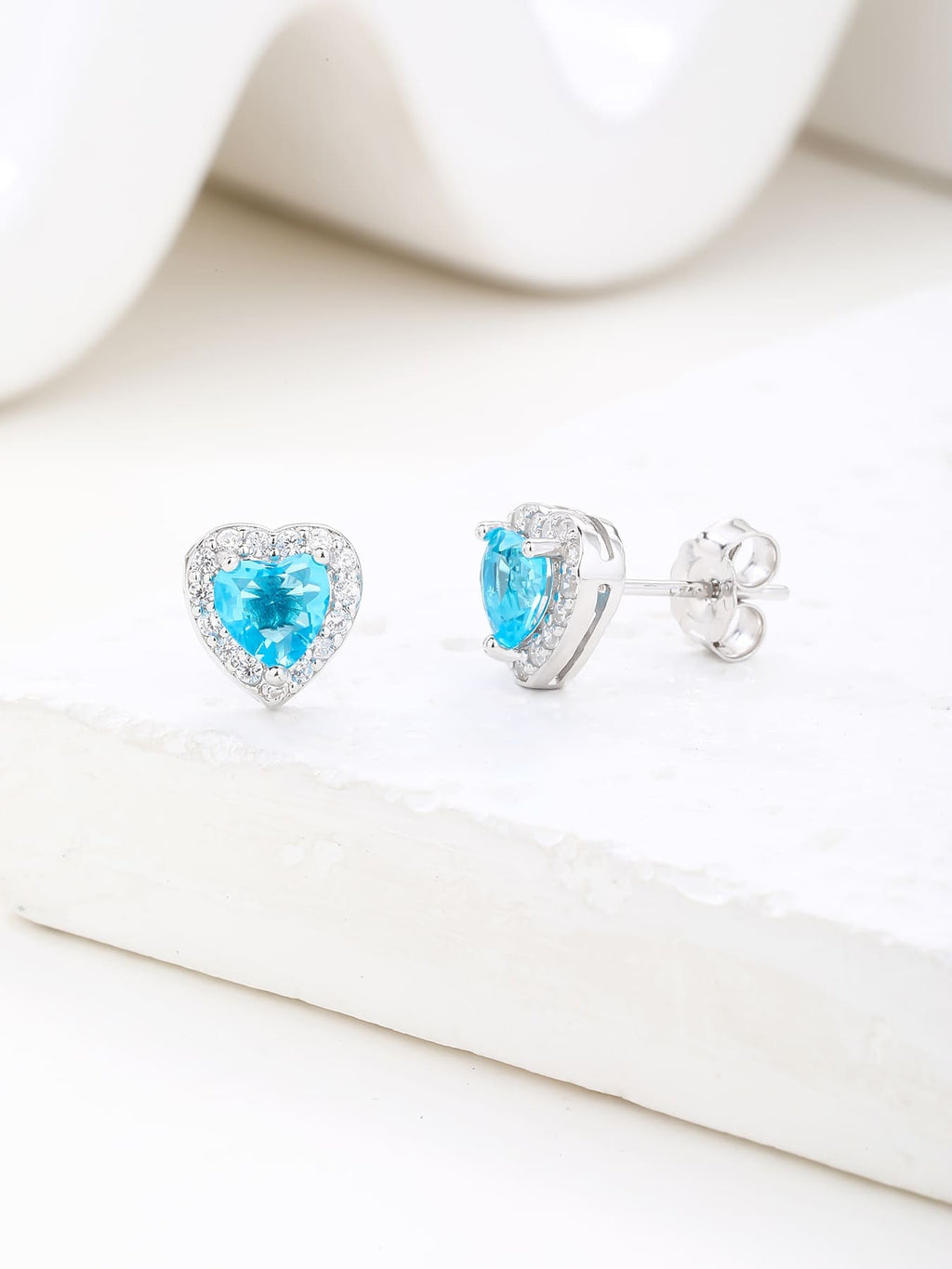 light blue heart shaped stone stud earrings with white cubic zirconia in hallmarked, rhodium-plated 925 sterling silver – display view – DRESCHER Jewellery®