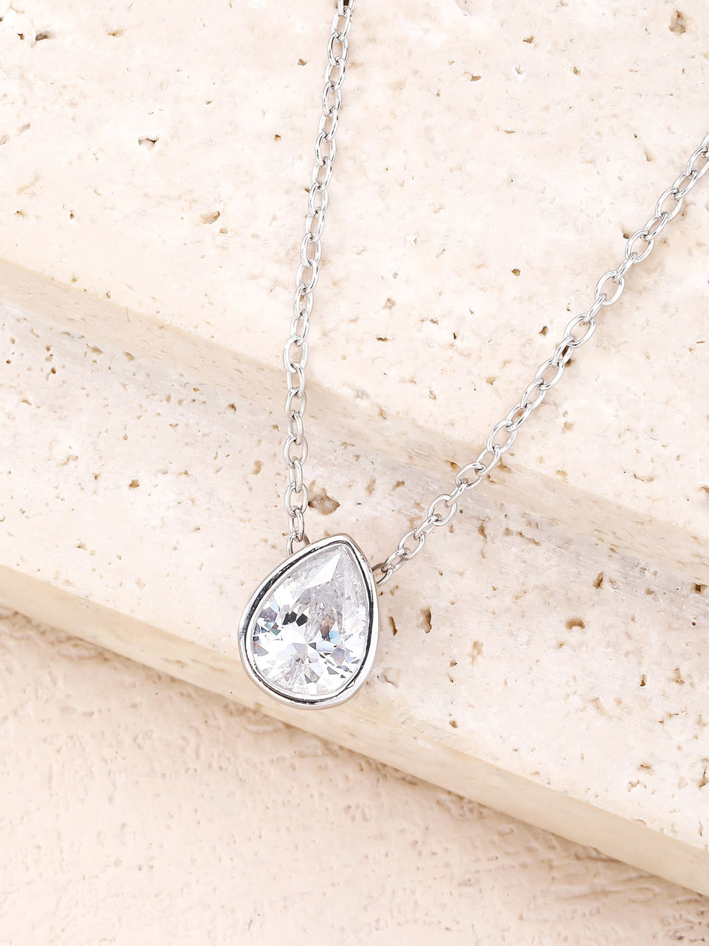 water drop white cubic zirconia necklace in hallmarked, rhodium-plated 925 sterling silver – lifestyle view – DRESCHER Jewellery®