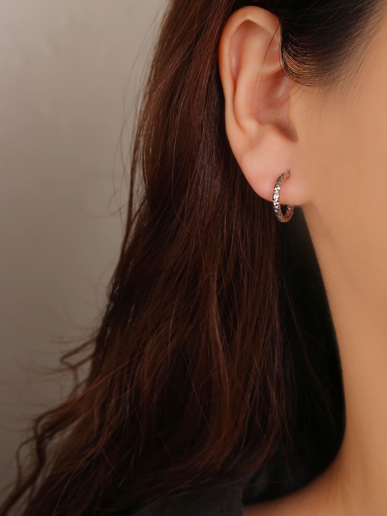 diamond-engraved hoop earrings in hallmarked, rhodium-plated 925 sterling silver – worn view – DRESCHER Jewellery®
