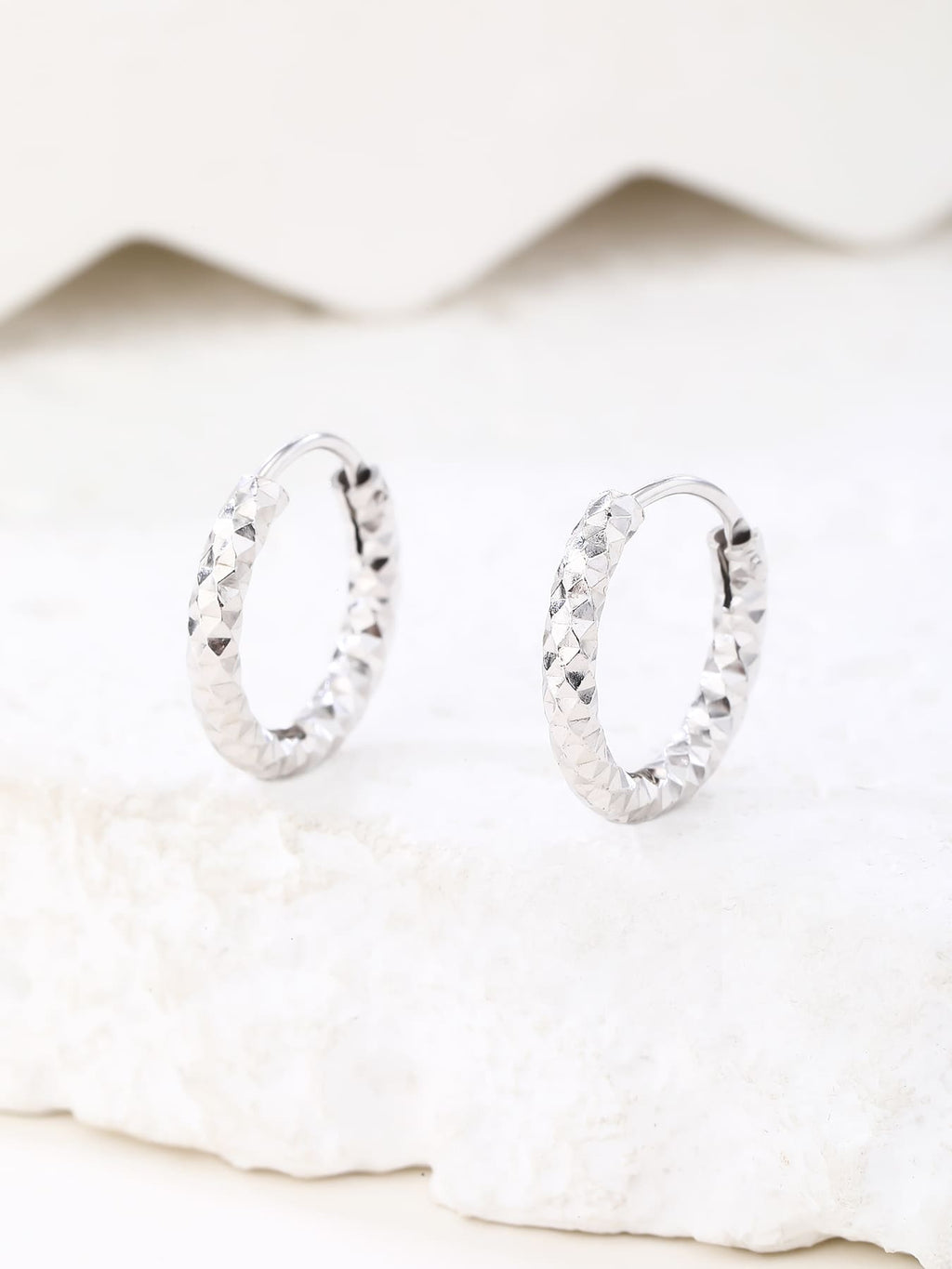 diamond-engraved hoop earrings in hallmarked, rhodium-plated 925 sterling silver – display view – DRESCHER Jewellery®