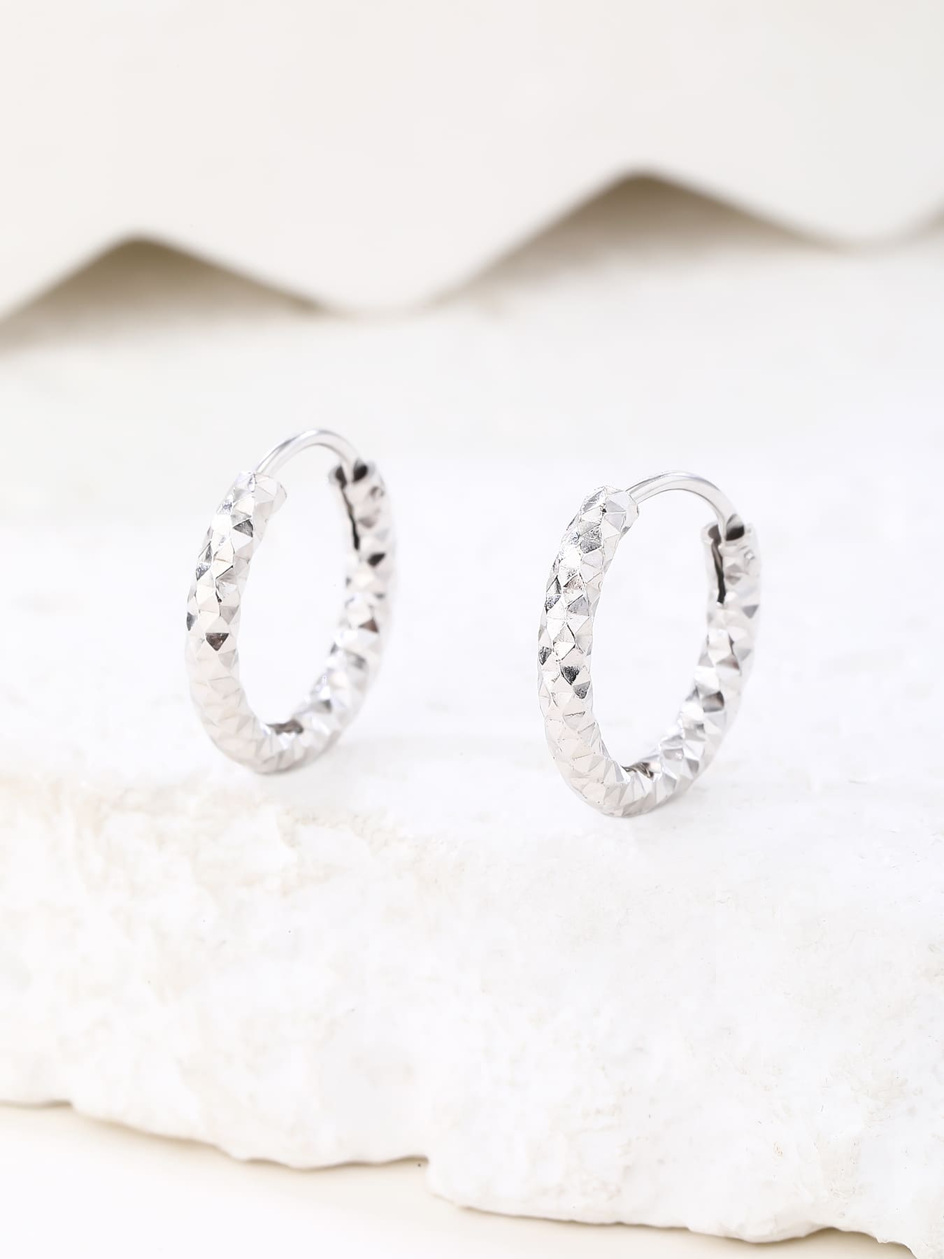 diamond-engraved hoop earrings in hallmarked, rhodium-plated 925 sterling silver – display view – DRESCHER Jewellery®