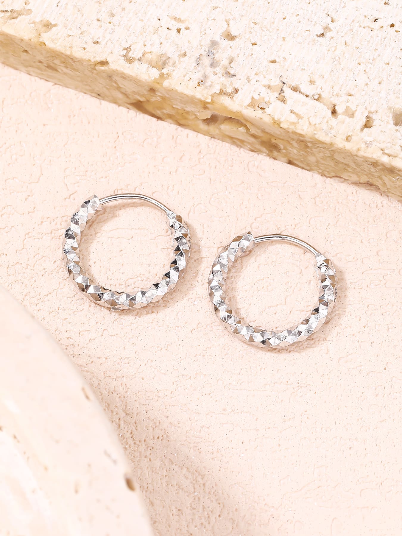 diamond-engraved hoop earrings in hallmarked, rhodium-plated 925 sterling silver – lifestyle view – DRESCHER Jewellery®