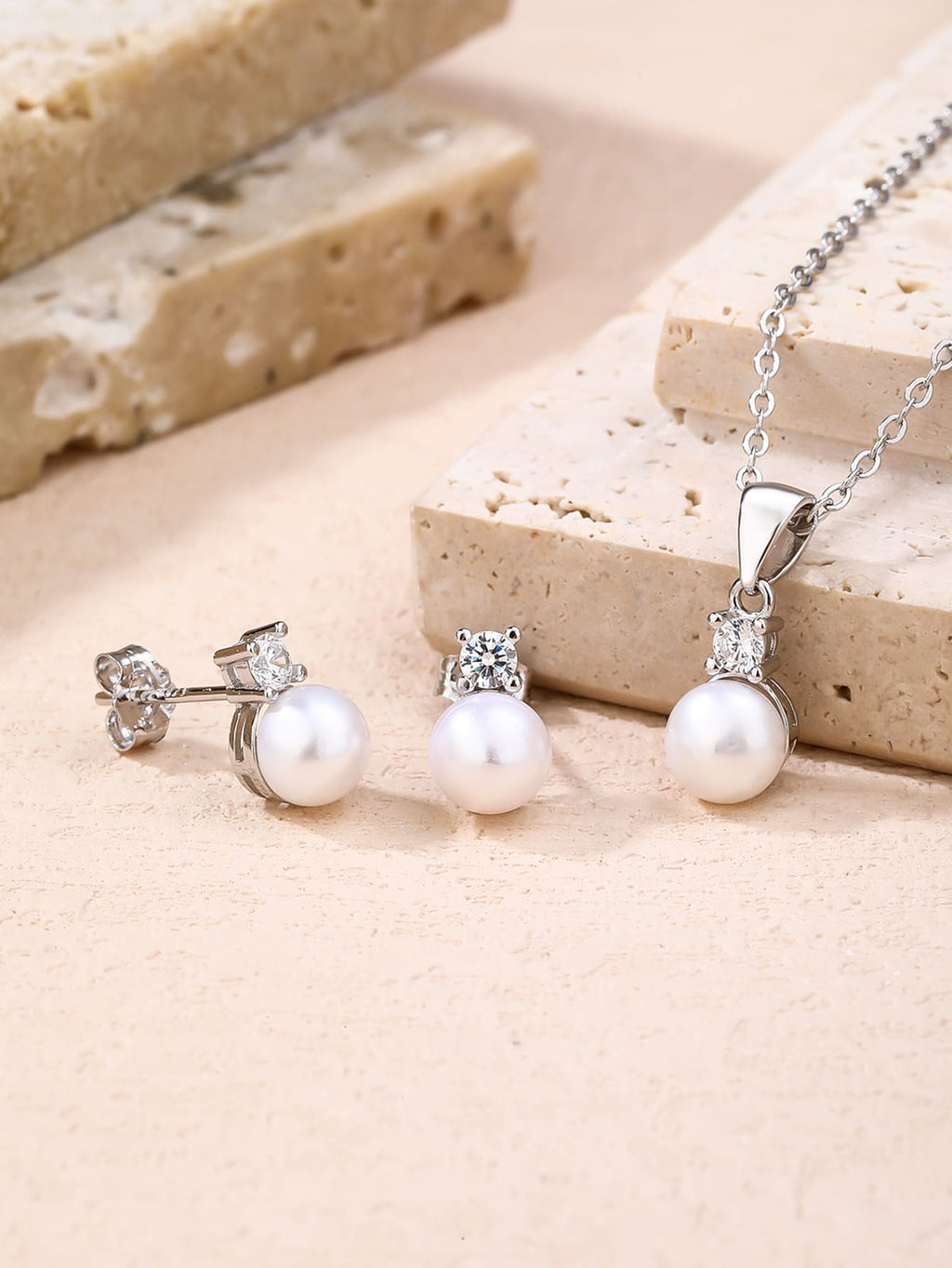 White pearl and cubic zirconia jewellery set with silver components crafted from hallmarked, rhodium-plated 925 sterling silver – display arrangement – DRESCHER Jewellery®