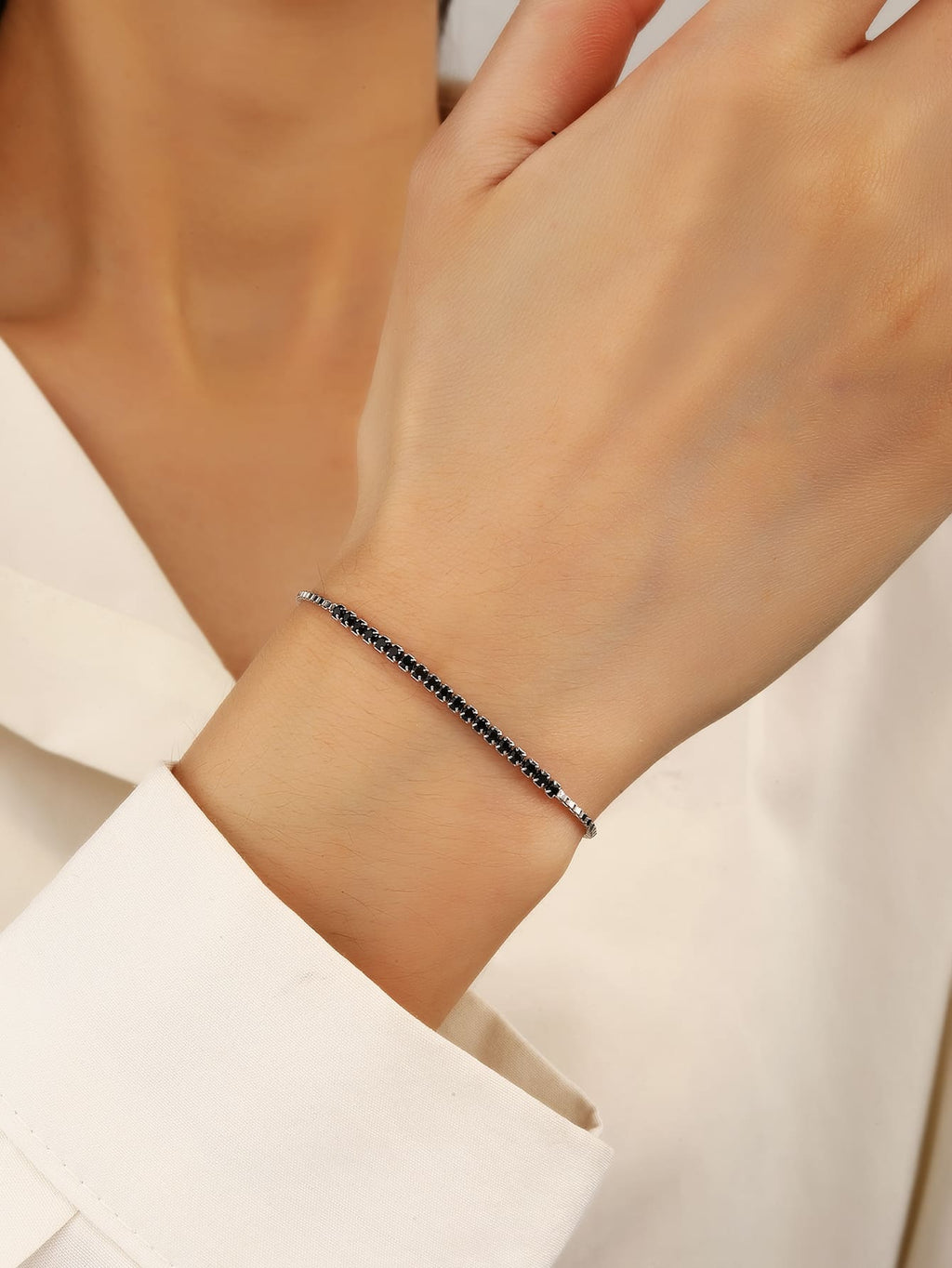 Black cubic zirconia hallmarked, rhodium-plated 925 sterling silver bracelet – worn view – DRESCHER Jewellery®