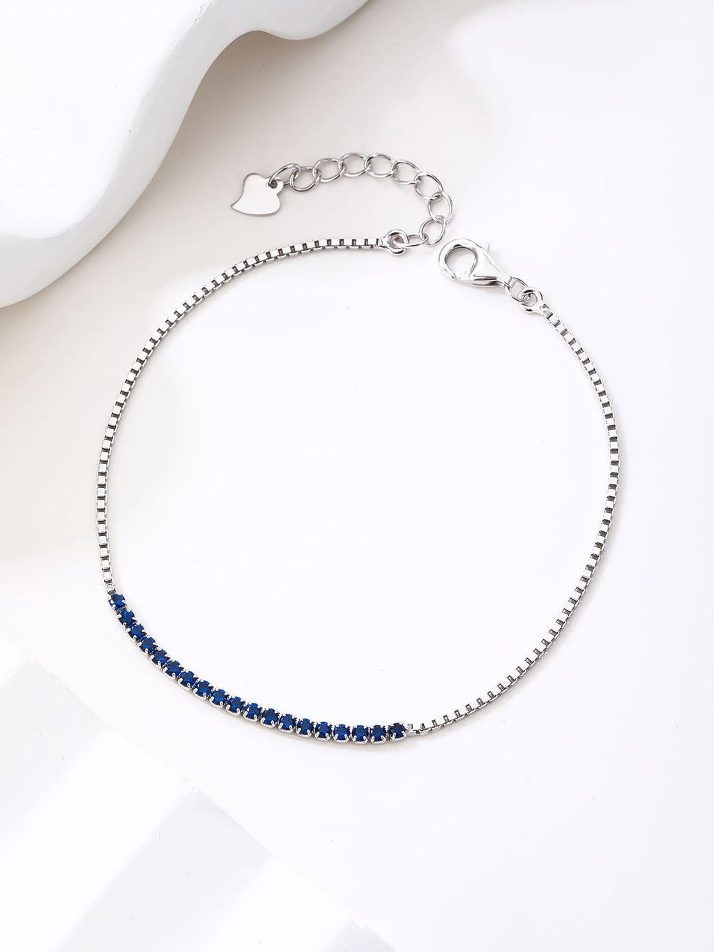 Bracelet with blue zirconia stones in hallmarked, rhodium-plated 925 sterling silver – lifestyle view – DRESCHER Jewellery®