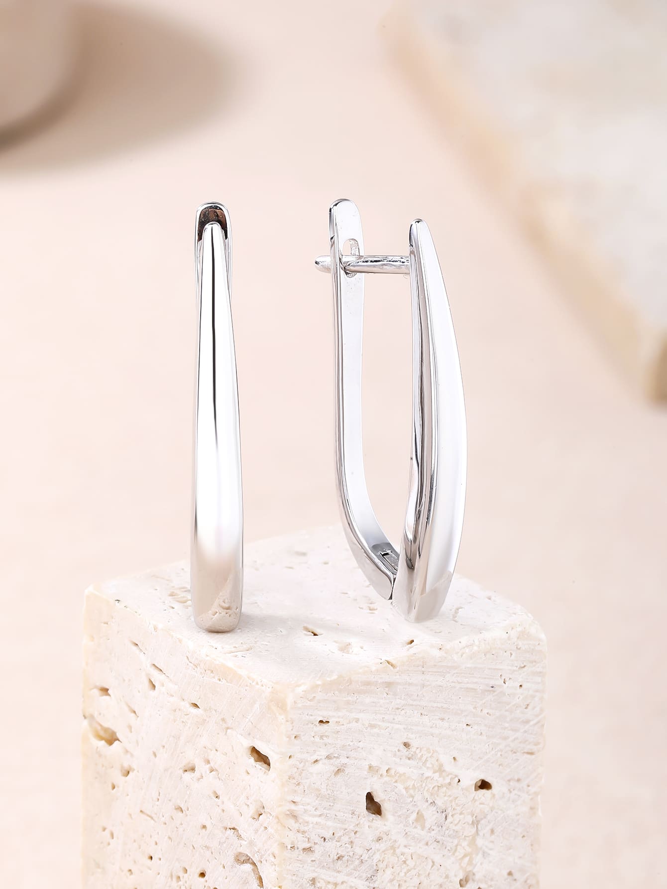 stone-free French-clasp earrings in hallmarked, rhodium-plated 925 sterling silver – lifestyle view – DRESCHER Jewellery®