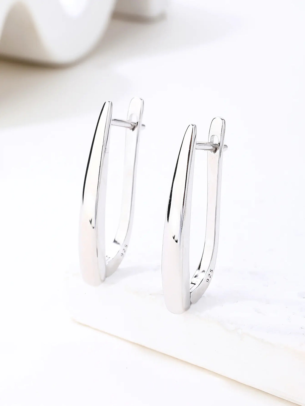 French clasp earrings with a clean, stone free design