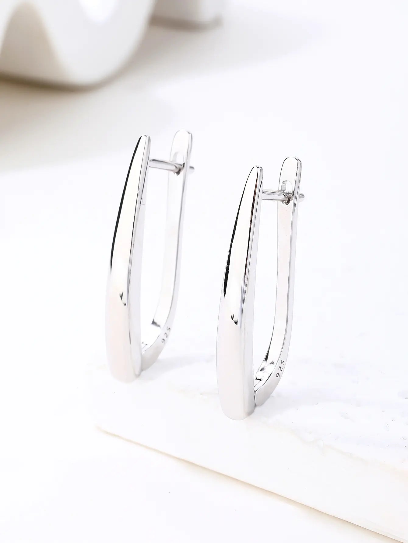 French clasp earrings with a clean, stone free design
