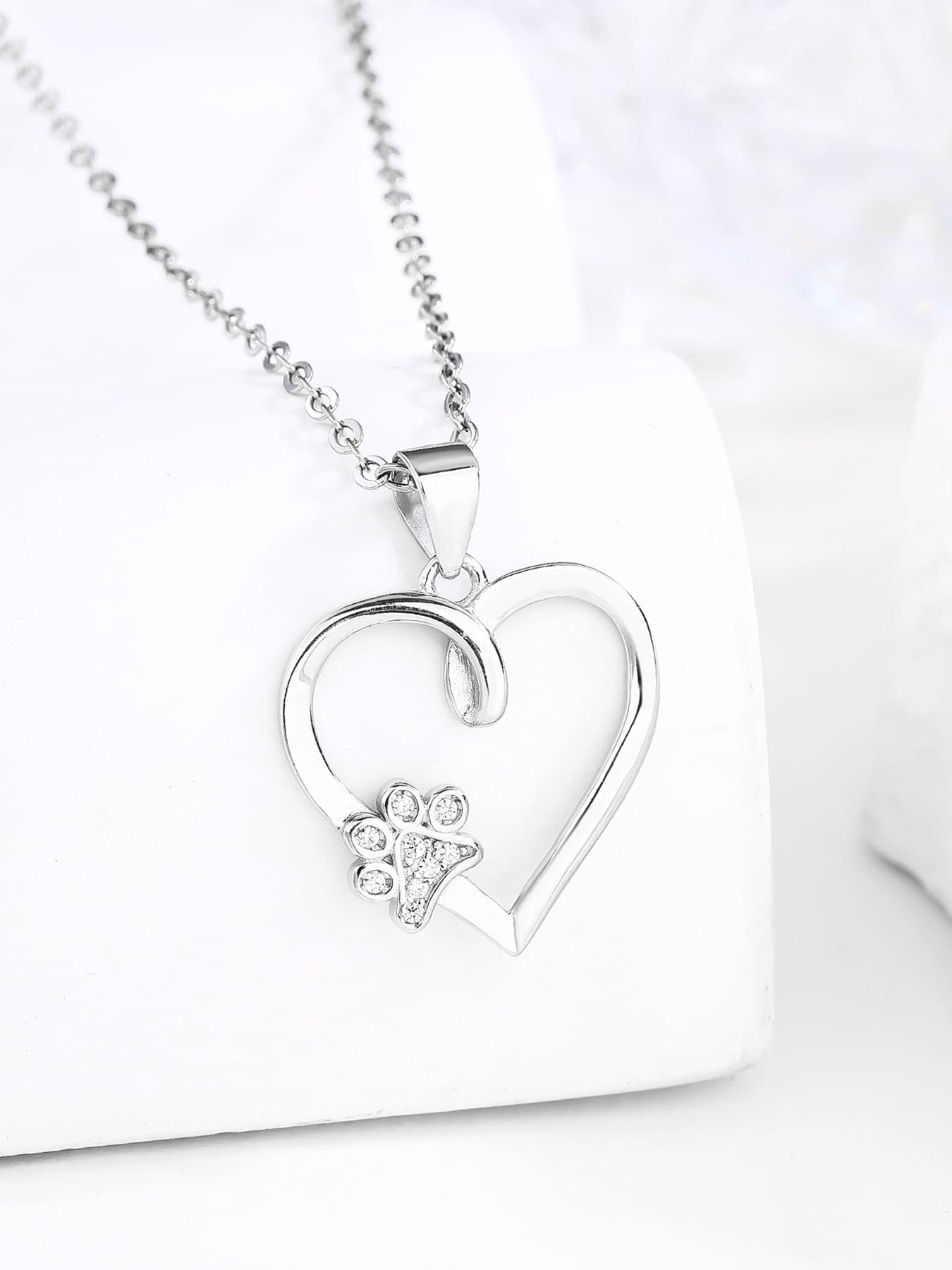 Paw in my heart silver pendant in hallmarked, rhodium-plated 925 sterling silver – front view on chain – DRESCHER Jewellery®