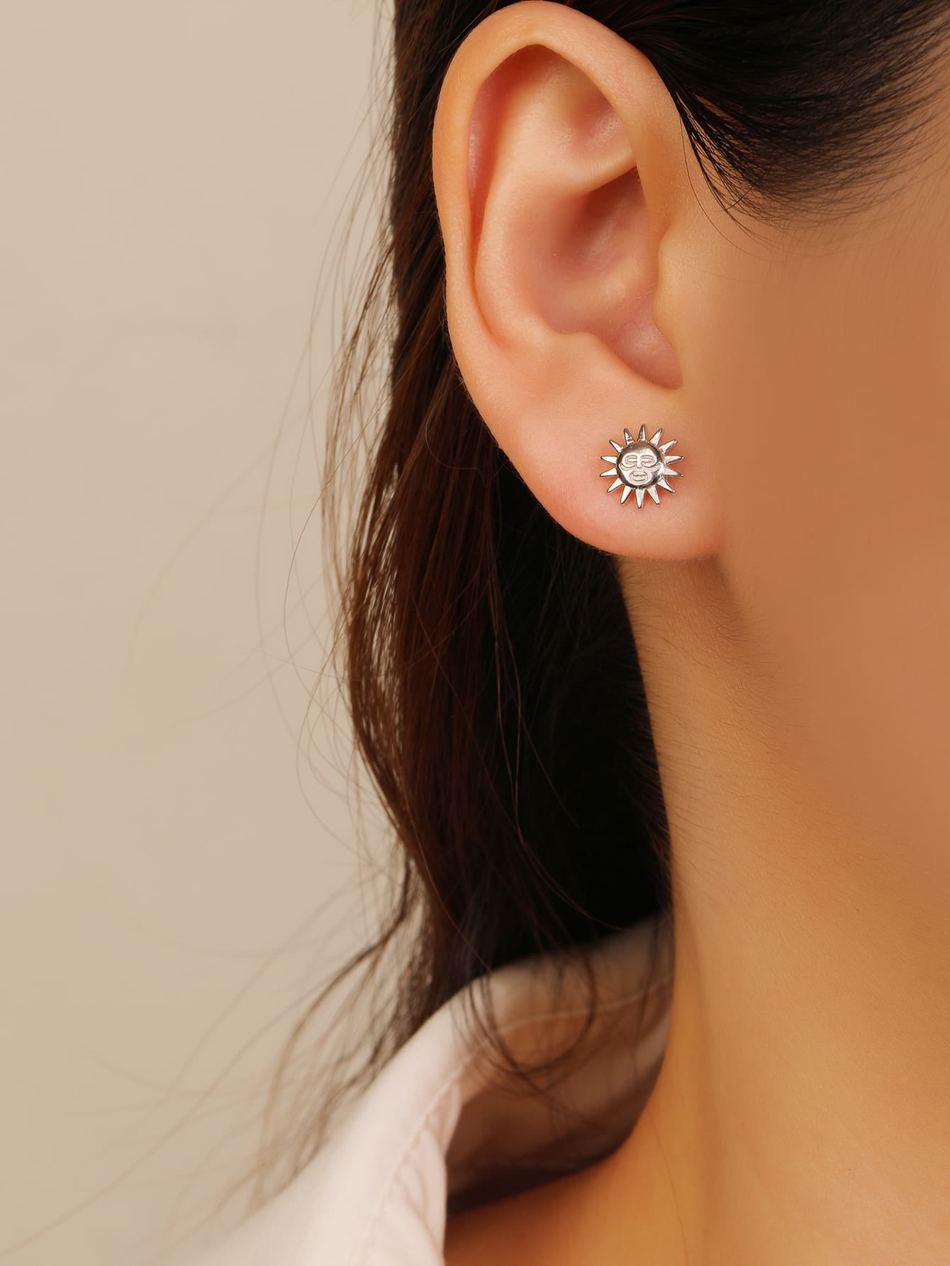 Sunflower stud earrings in hallmarked, rhodium-plated 925 sterling silver – worn view – DRESCHER Jewellery®