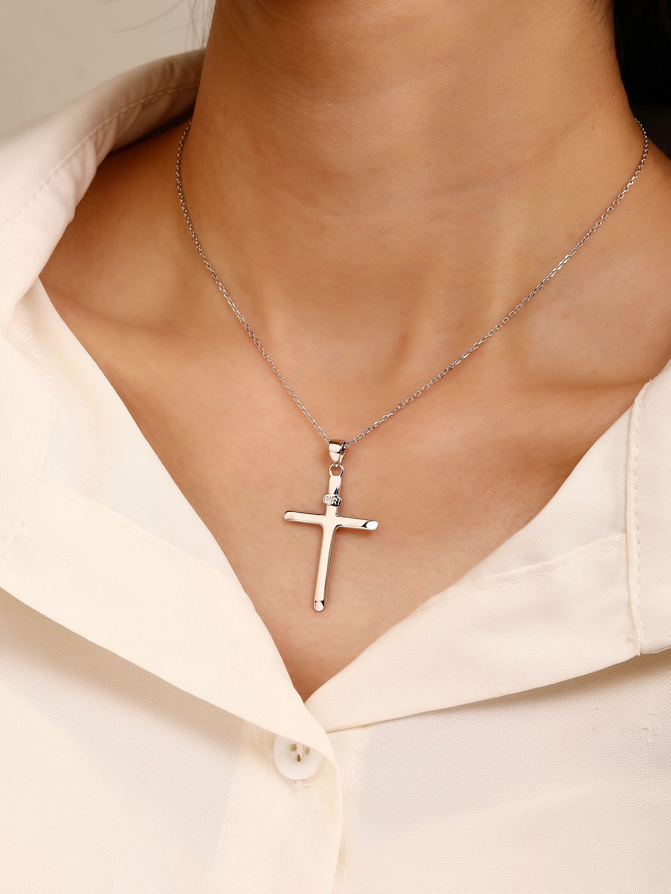 cross pendant with "INRI" inscription in hallmarked, rhodium-plated 925 sterling silver – worn view – DRESCHER Jewellery®