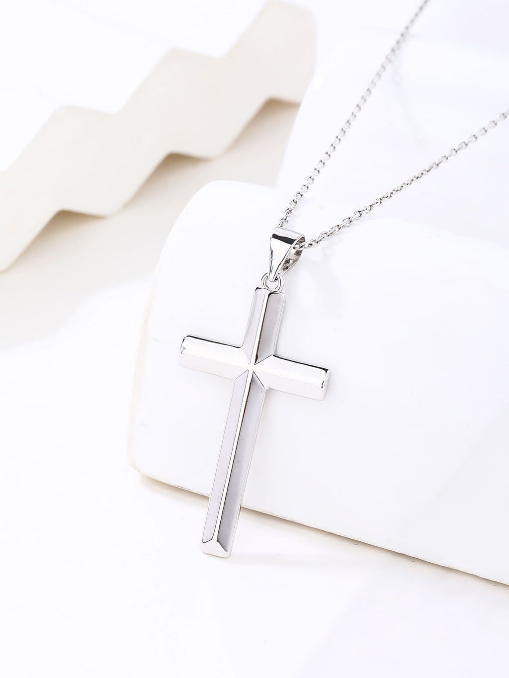 cross pendant in hallmarked, rhodium-plated 925 sterling silver – lifestyle view – DRESCHER Jewellery®