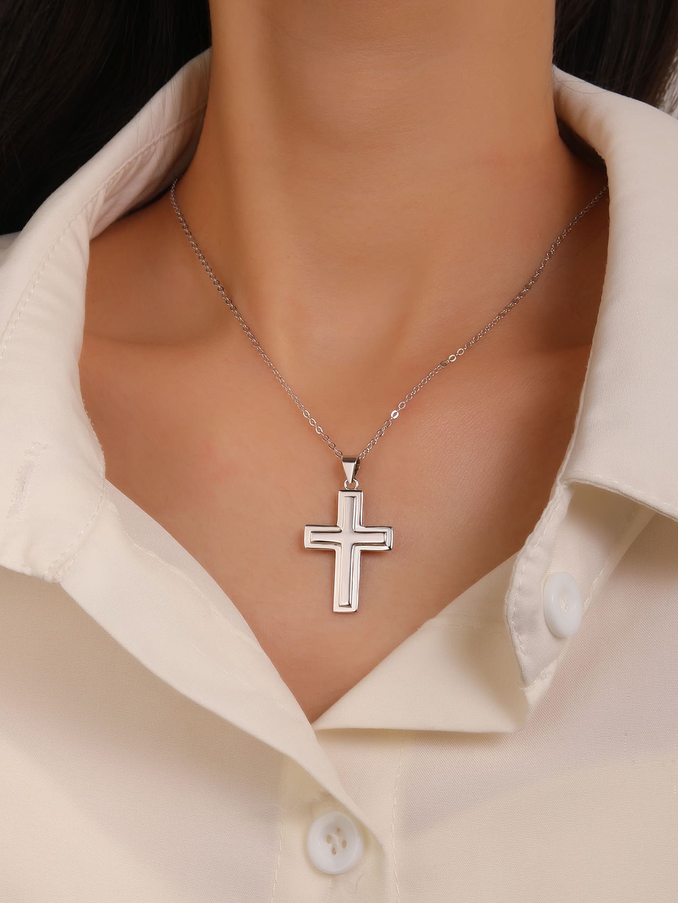 cross pendant with frame in hallmarked, rhodium-plated 925 sterling silver – worn view – DRESCHER Jewellery®