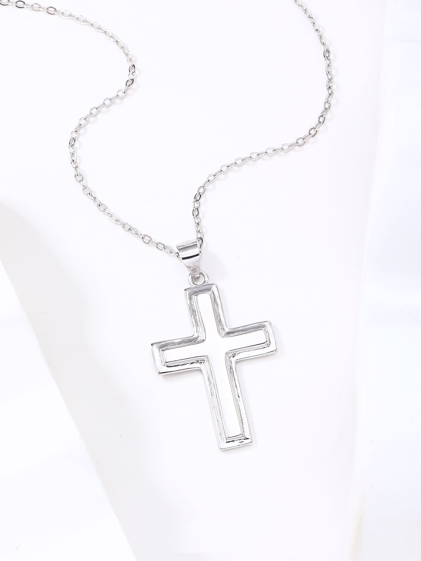 cross pendant with frame in hallmarked, rhodium-plated 925 sterling silver – lifestyle view – DRESCHER Jewellery®