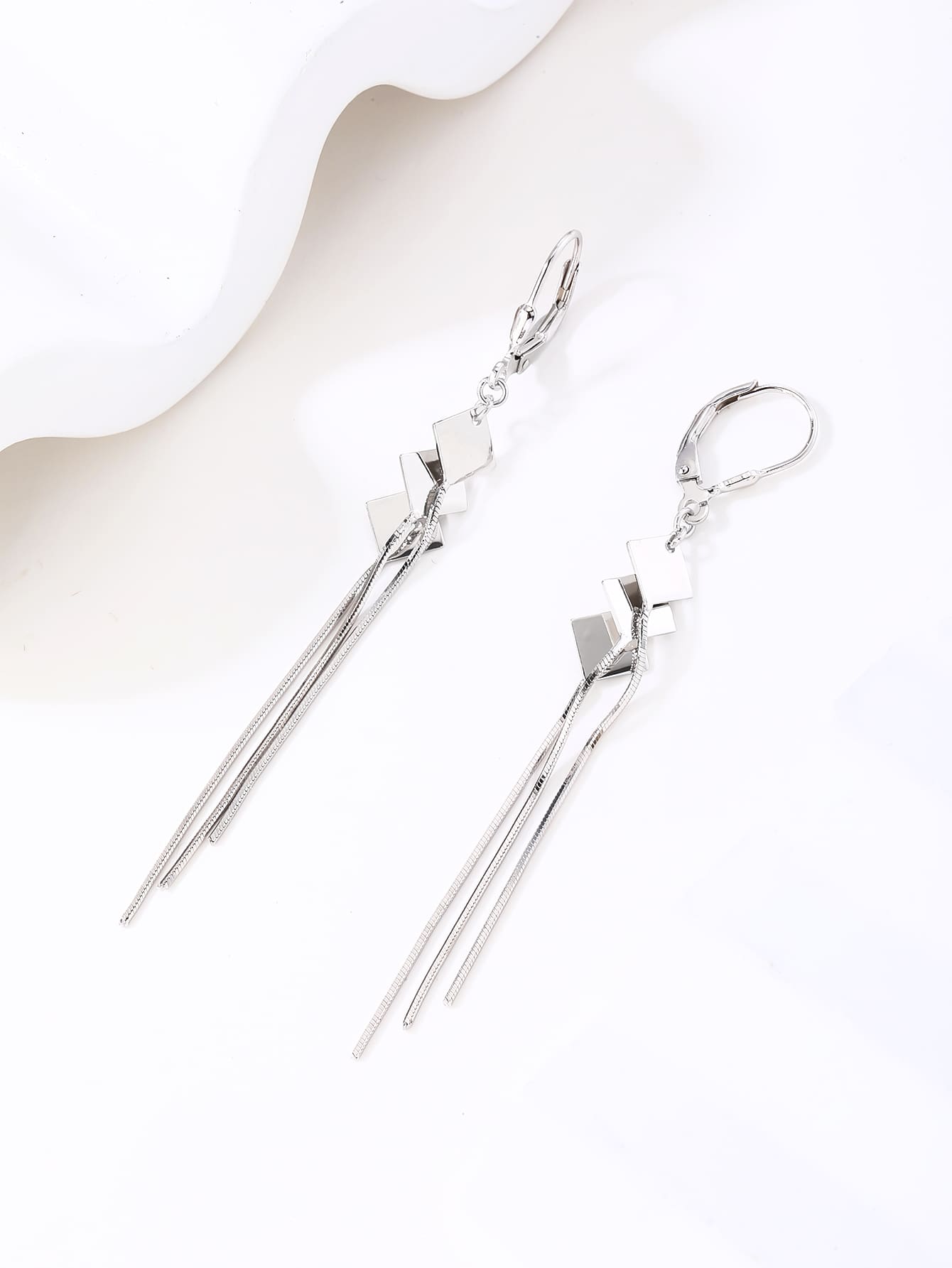 Geometric diamond-shaped chain drop leverback earrings in hallmarked, rhodium-plated 925 sterling silver – display view – DRESCHER Jewellery®