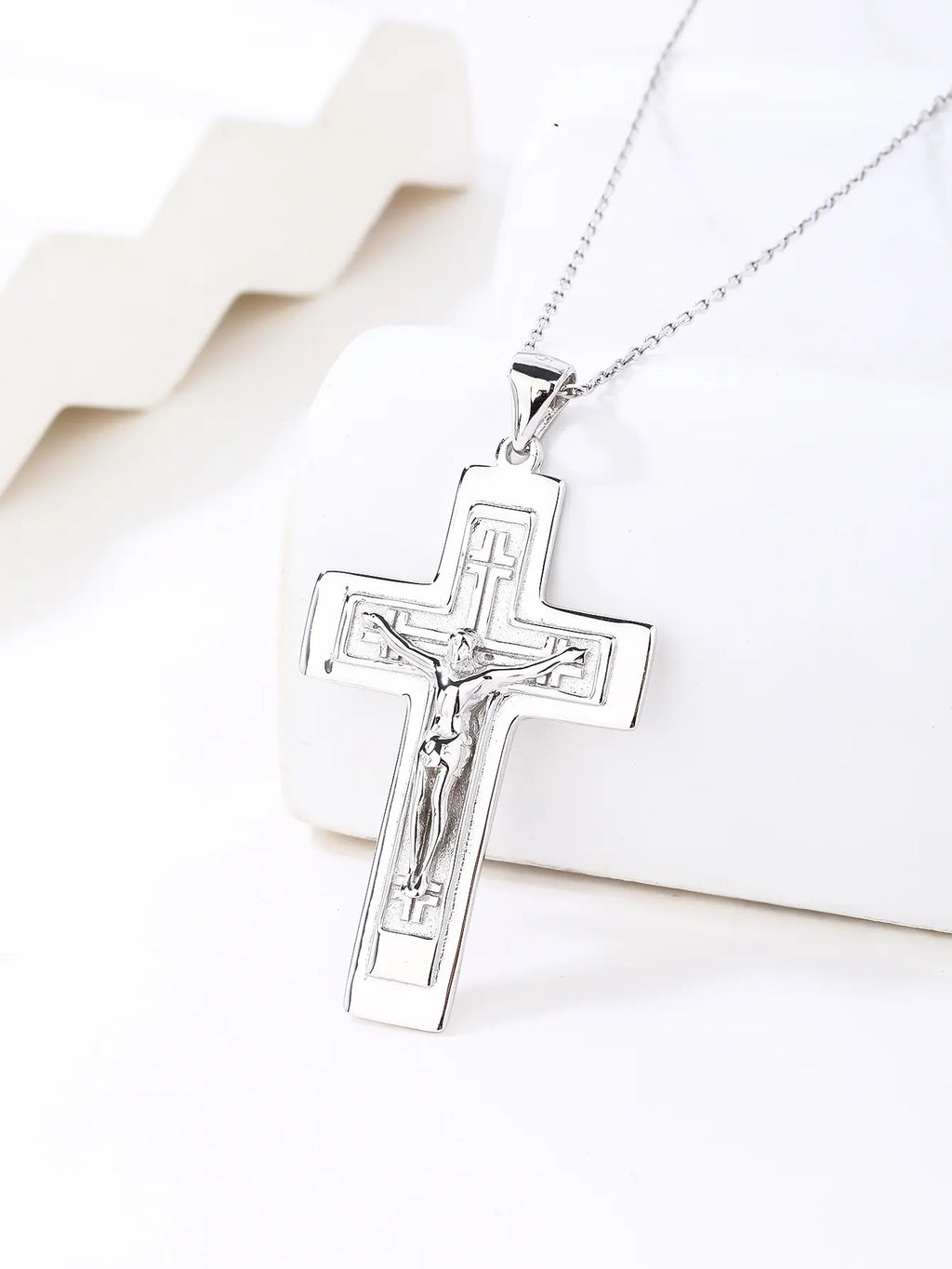 Rhodium plated cross pendant