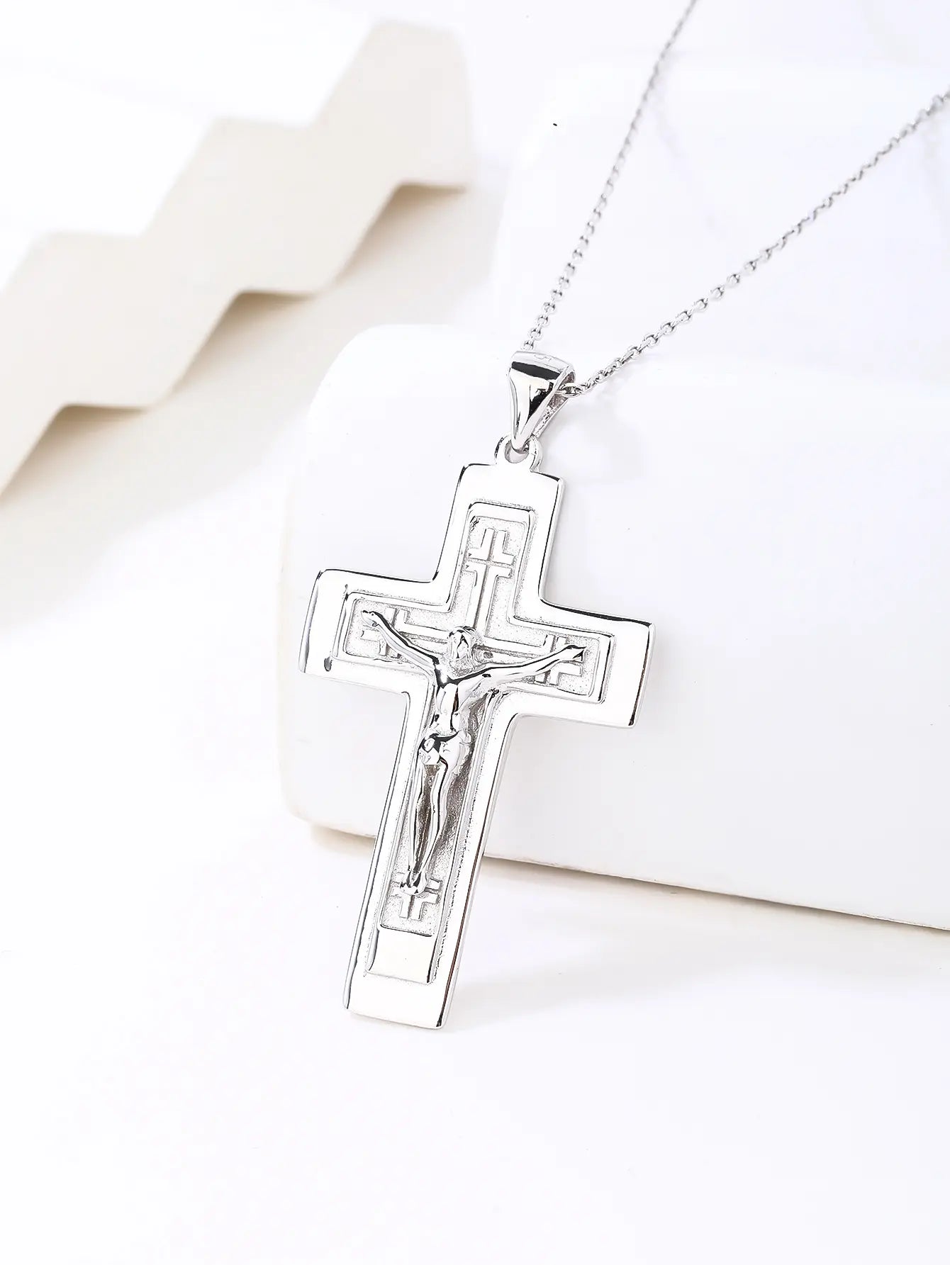 Rhodium plated cross pendant