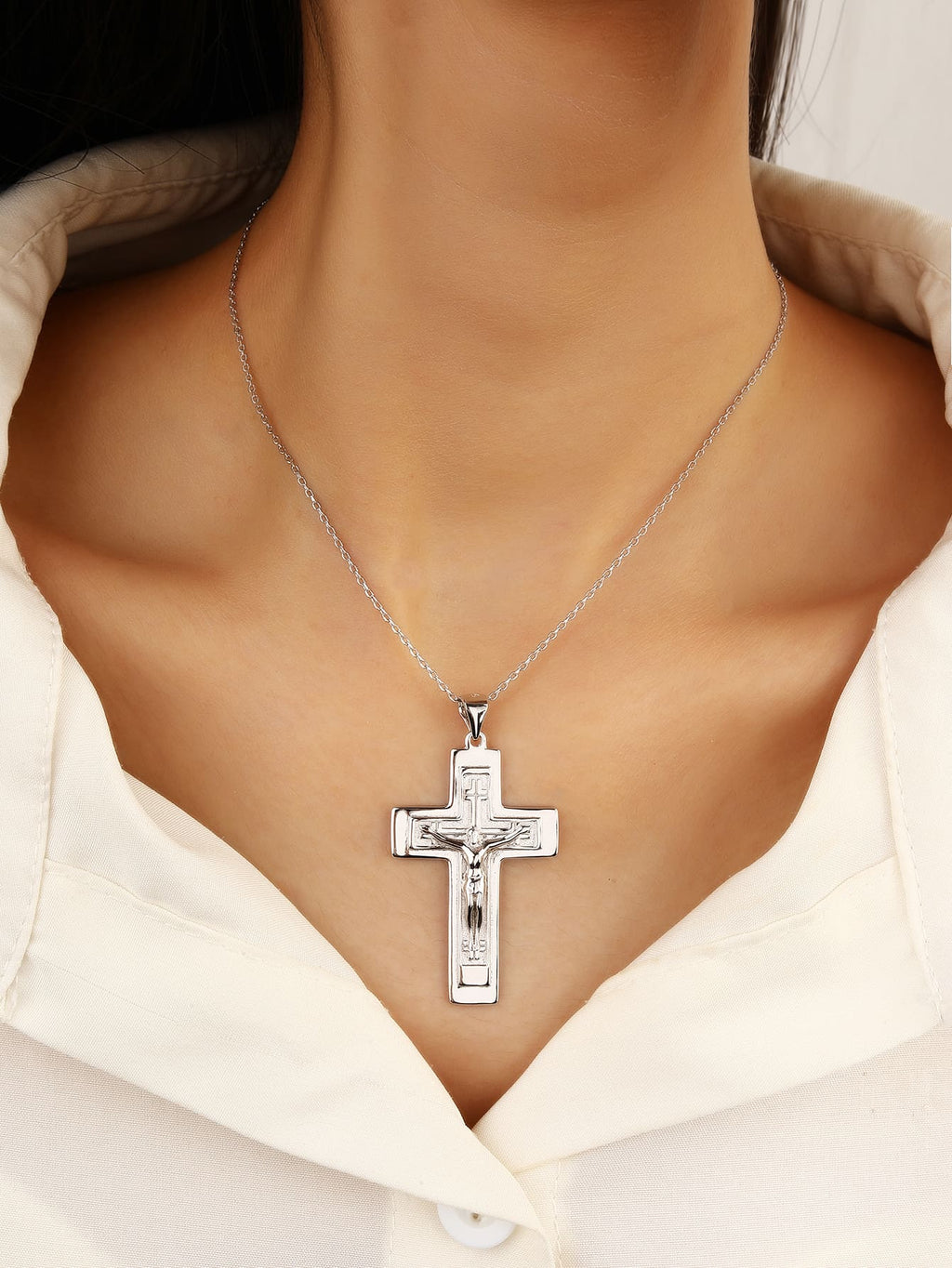 Crucifix hallmarked, rhodium-plated 925 sterling silver cross pendant – worn view – DRESCHER Jewellery®
