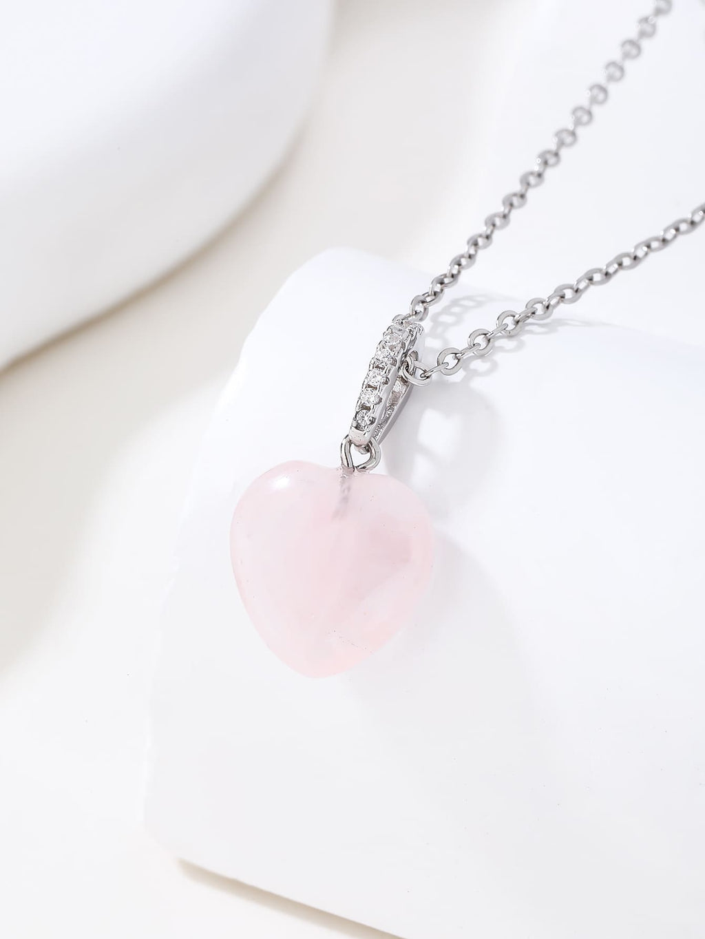 Rose Quartz Heart Pendant in hallmarked, rhodium-plated 925 sterling silver – lifestyle view – DRESCHER Jewellery®