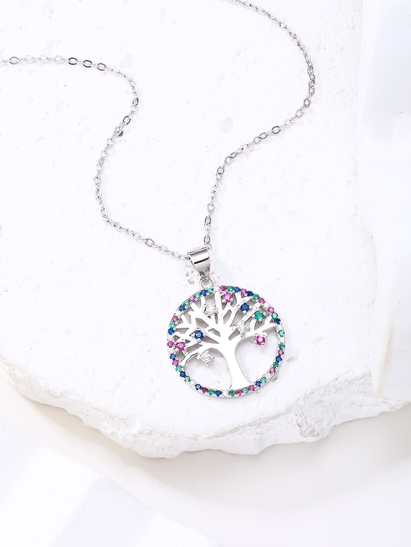 Coloured zirconia stone tree of life silver pendant - without chain in hallmarked, rhodium-plated 925 sterling silver – lifestyle view – DRESCHER Jewellery®