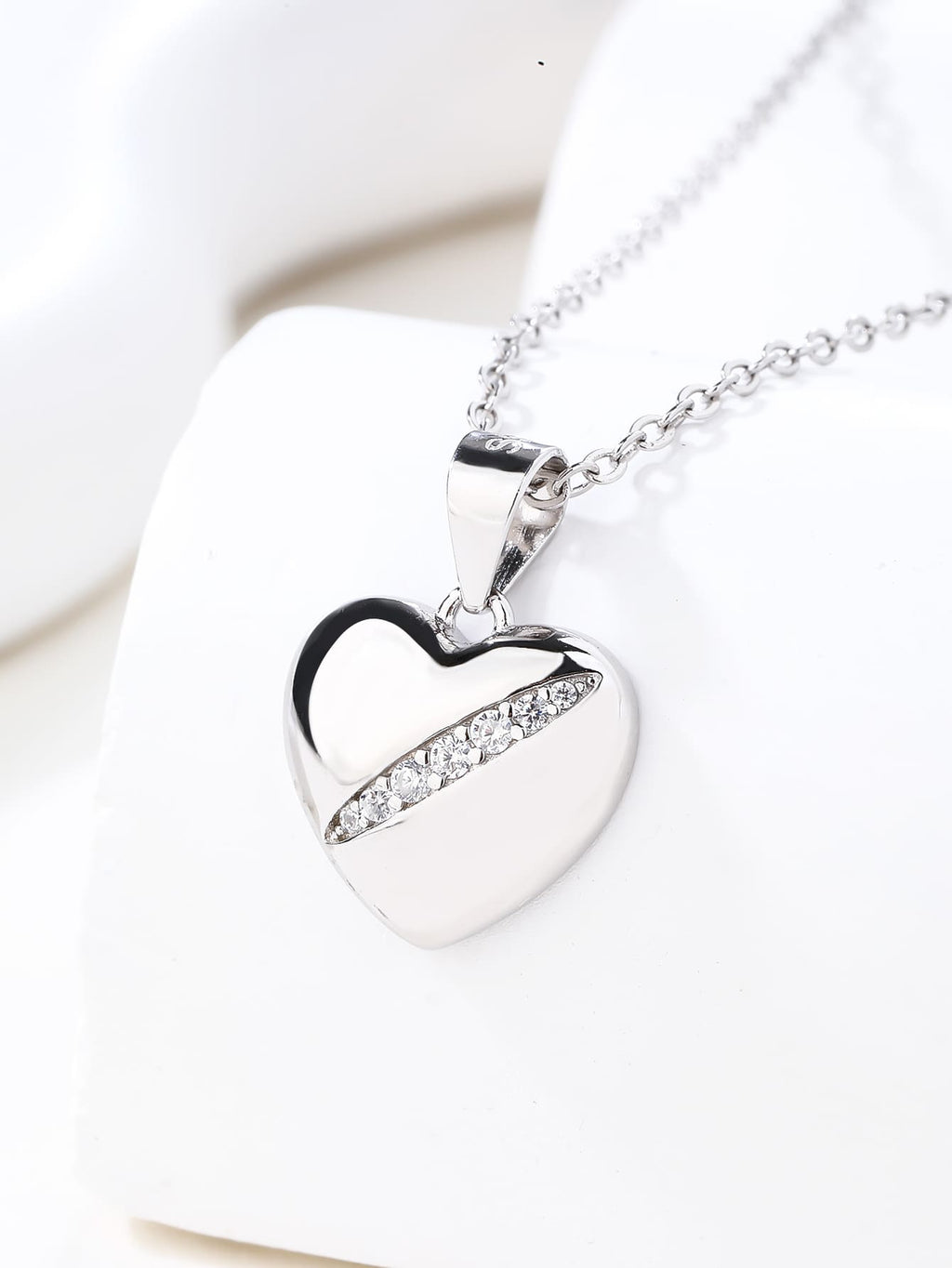 Heart pendant with zirconia in hallmarked, rhodium-plated 925 sterling silver – display view – DRESCHER Jewellery®