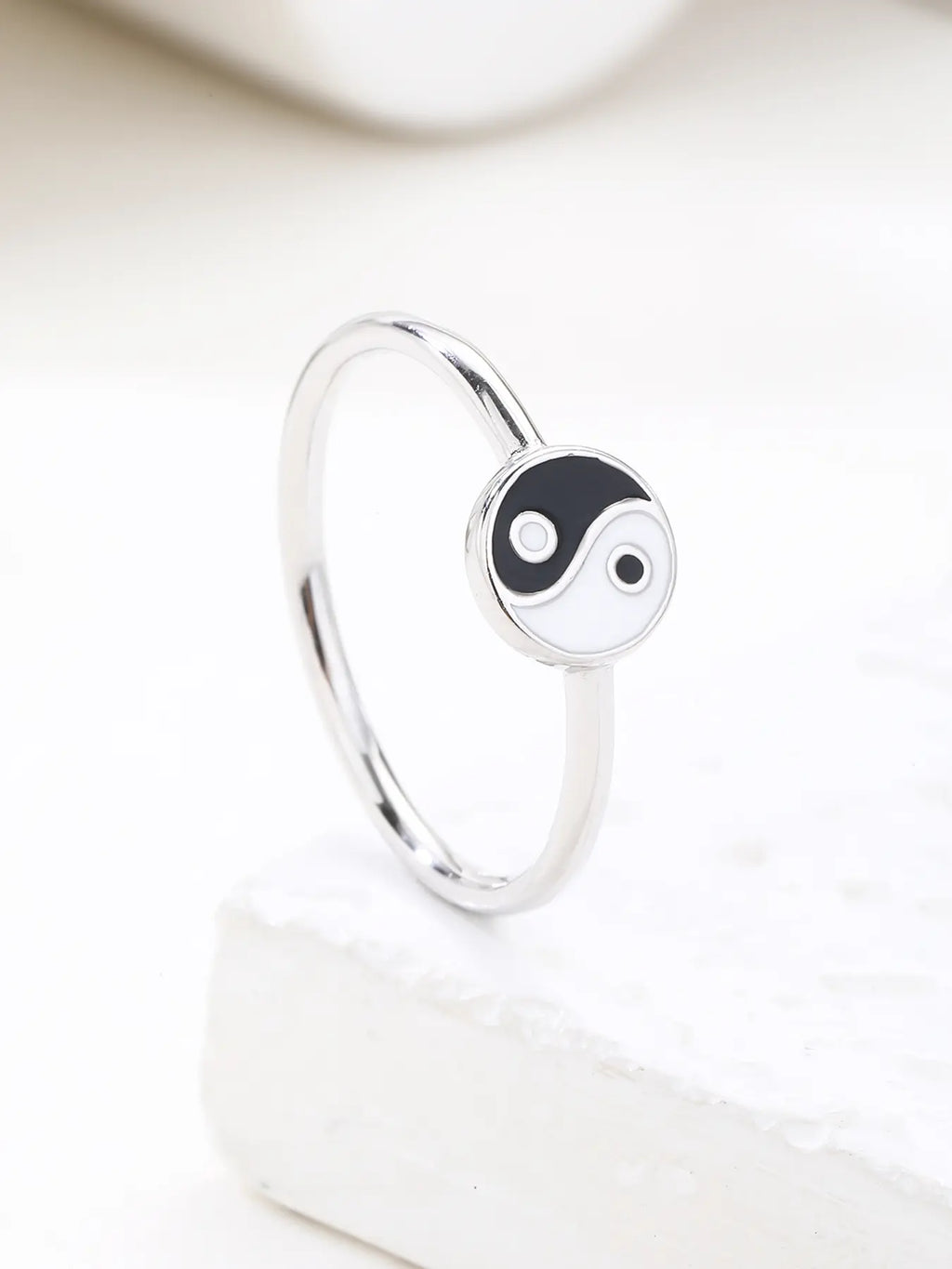 Silver ring with yin-yang symbol