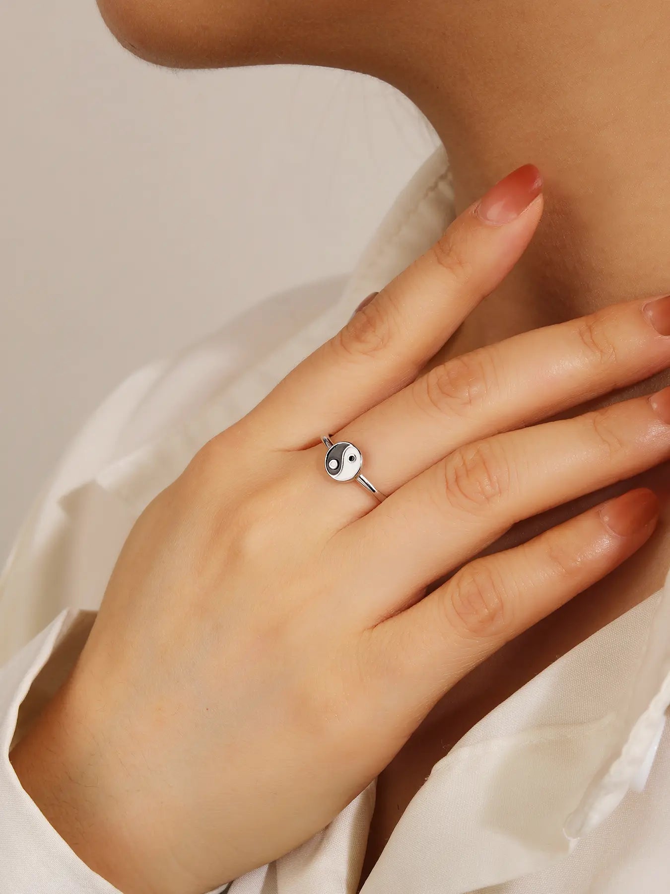 Silver ring with yin-yang symbol