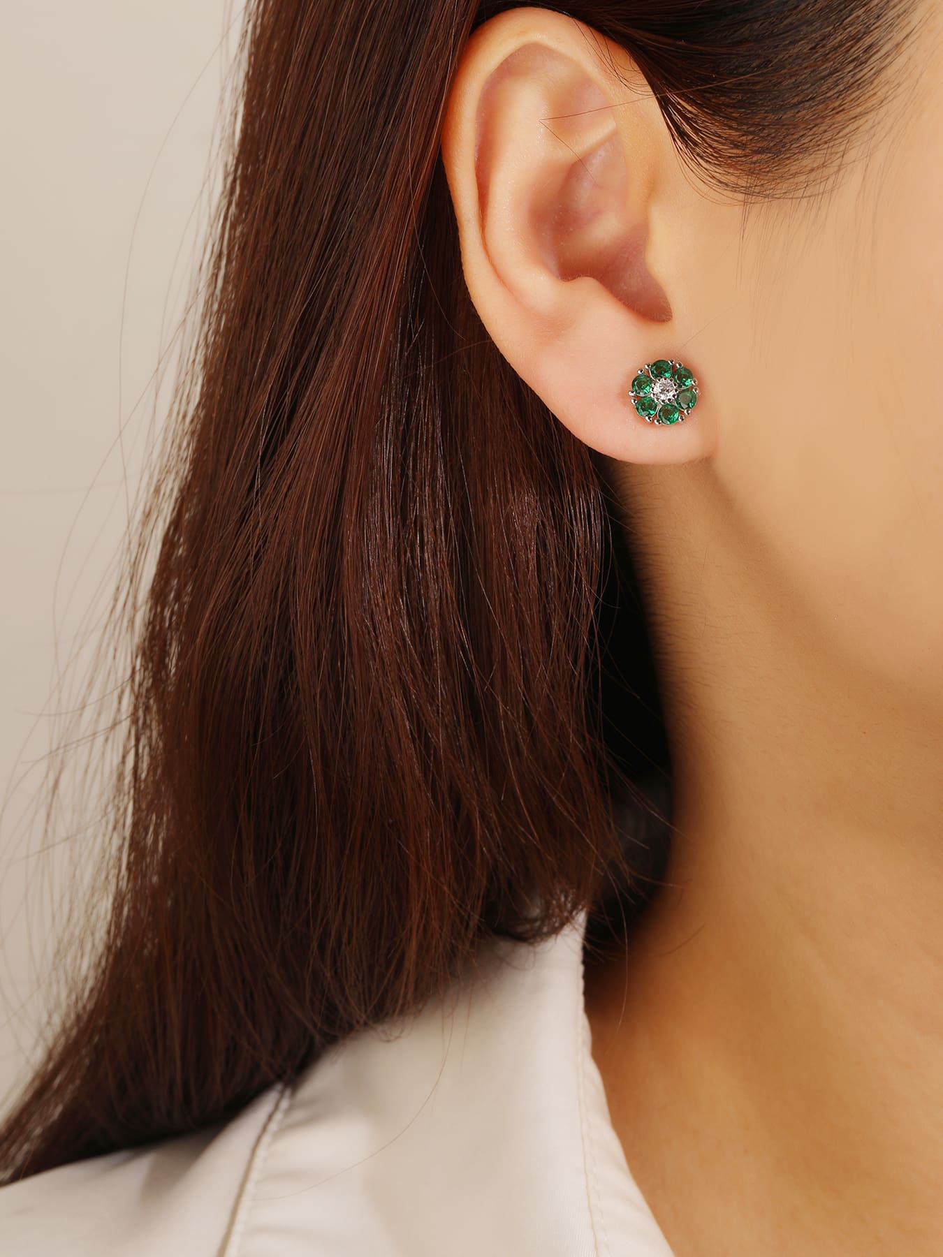 green flower stud earrings in hallmarked, rhodium-plated 925 sterling silver – worn view – DRESCHER Jewellery®